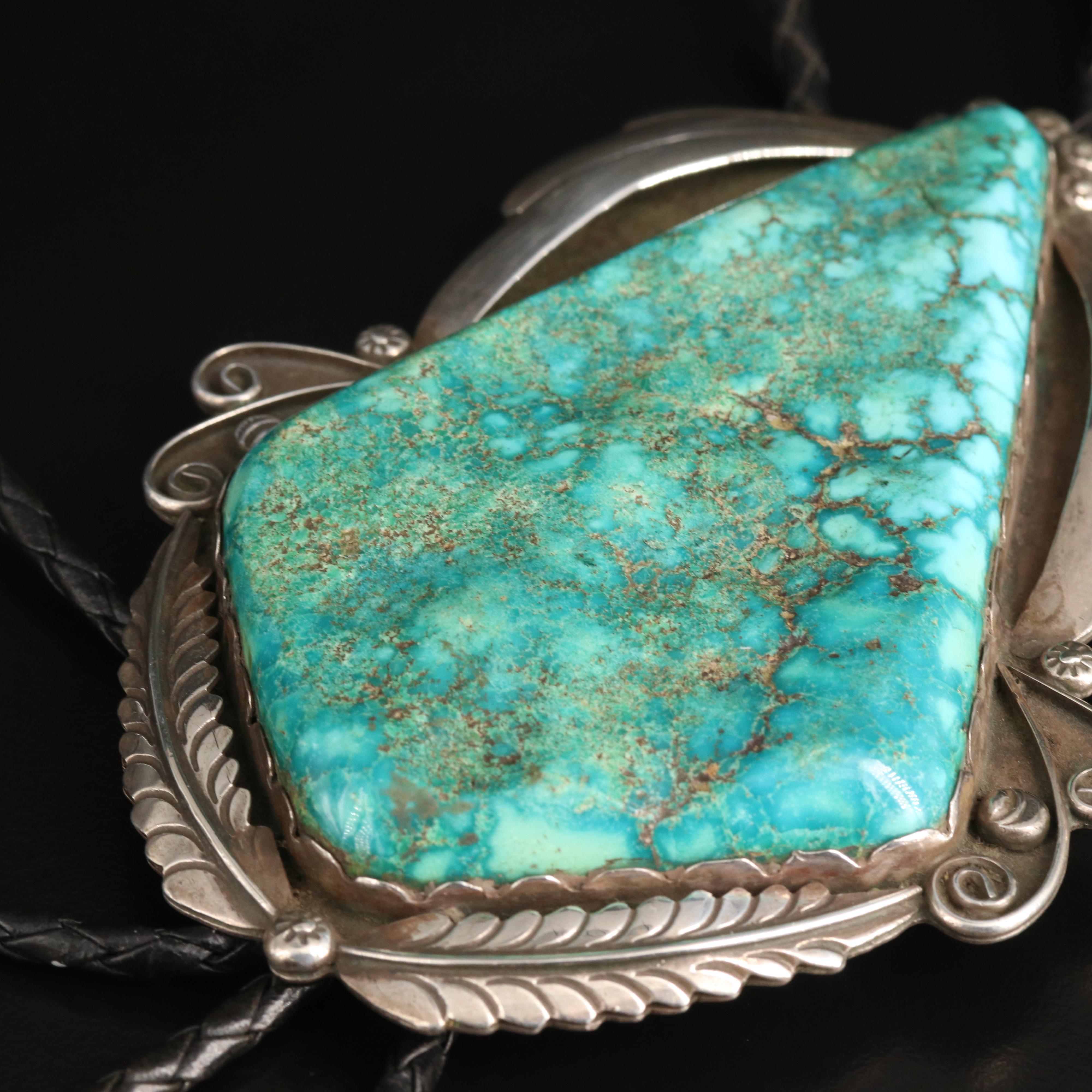 Signed 96.00 x 62.00 mm Turquoise Sterling Feather, Rain Drops and Wind Bolo Tie