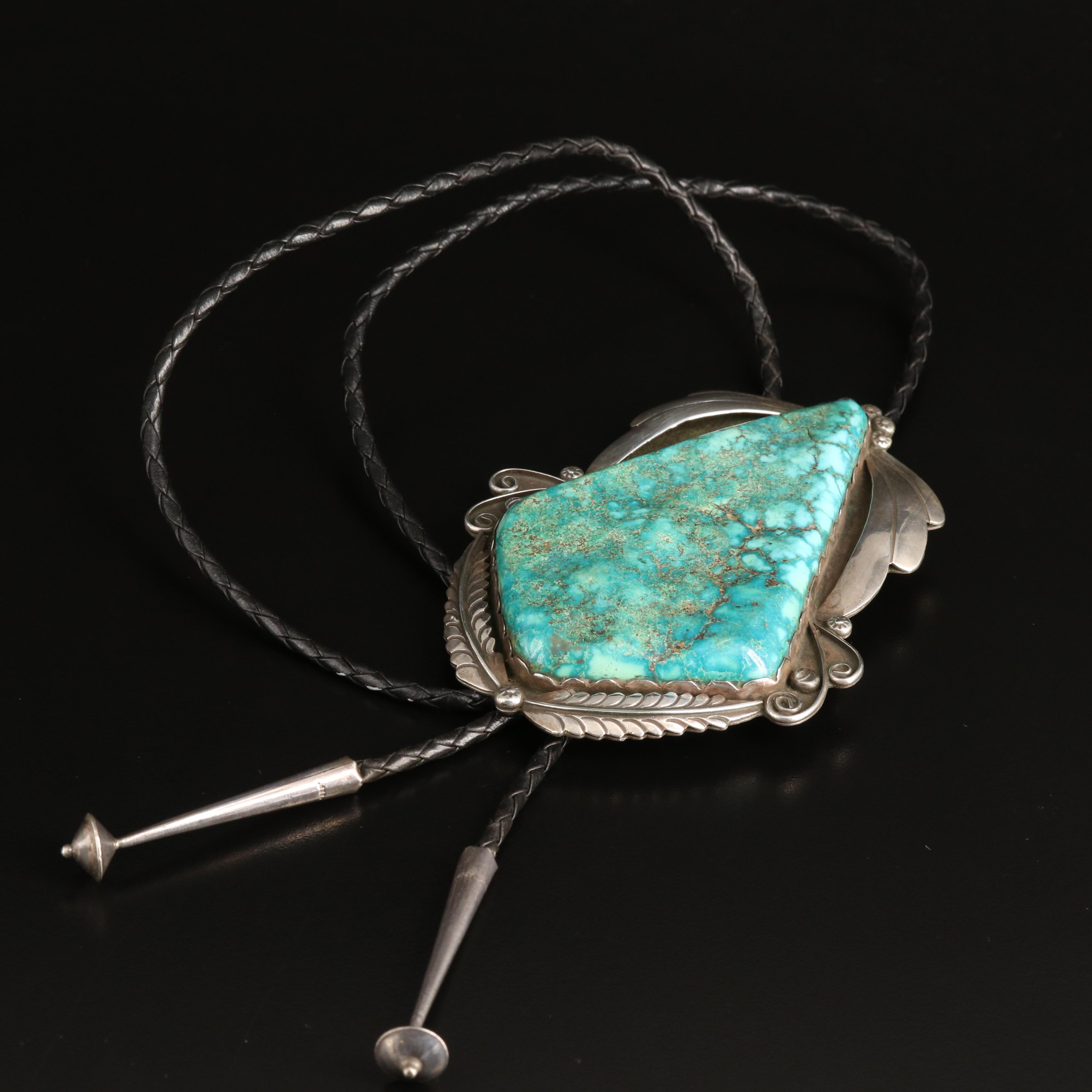 Signed 96.00 x 62.00 mm Turquoise Sterling Feather, Rain Drops and Wind Bolo Tie