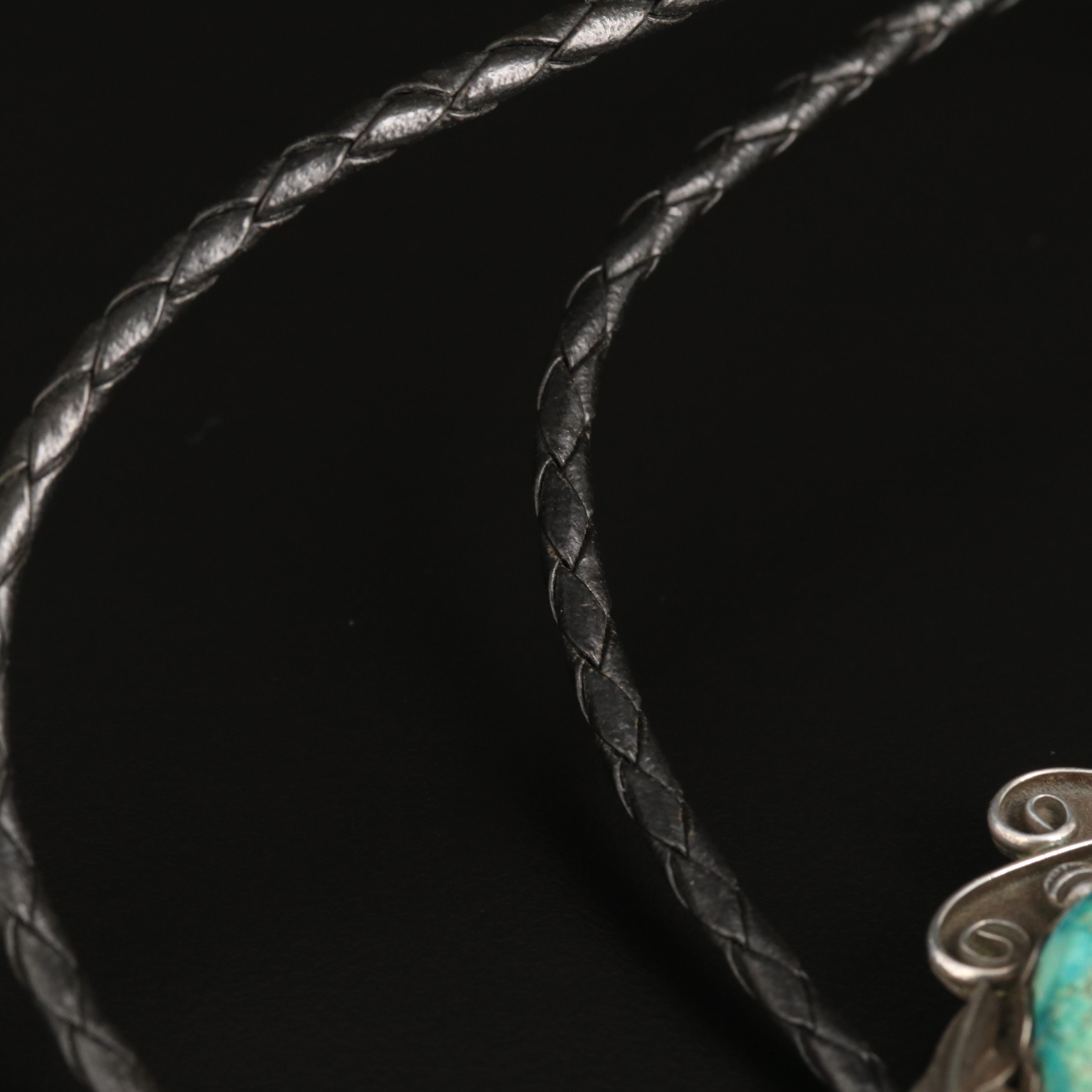 Signed 96.00 x 62.00 mm Turquoise Sterling Feather, Rain Drops and Wind Bolo Tie