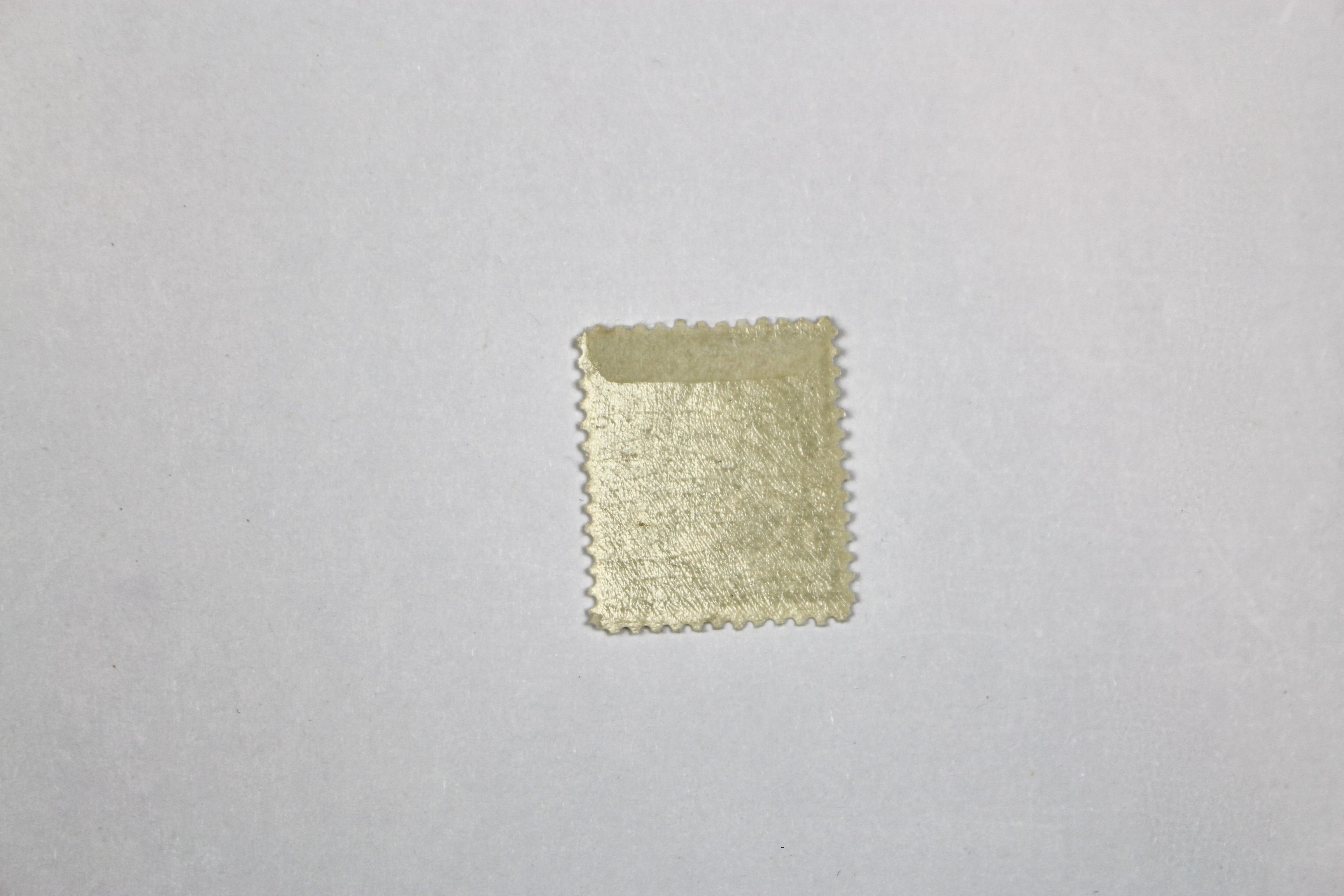 Four Early U.S. Mint Hinged Postage Stamps