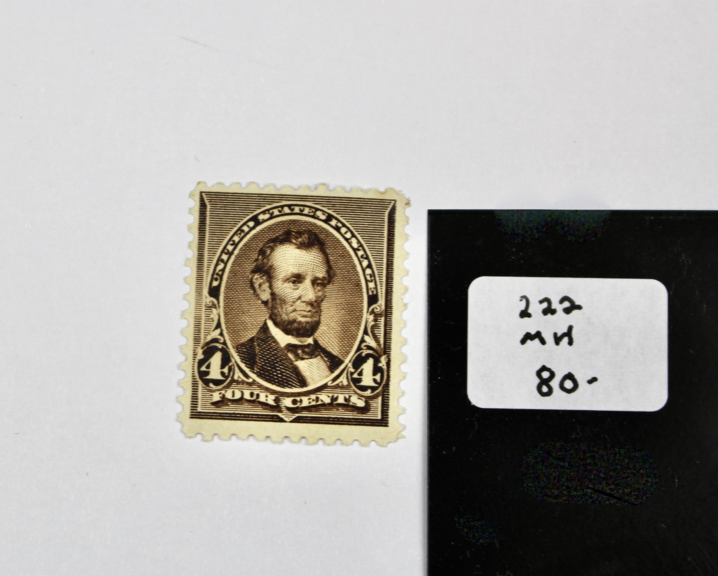 Four Early U.S. Mint Hinged Postage Stamps
