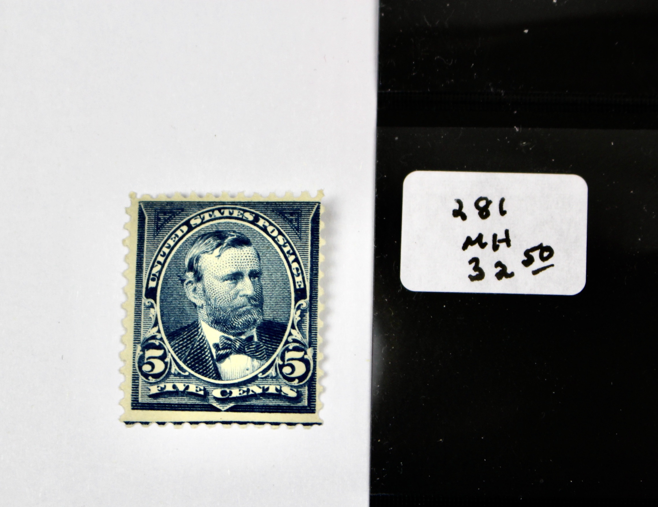 Four Early U.S. Mint Hinged Postage Stamps