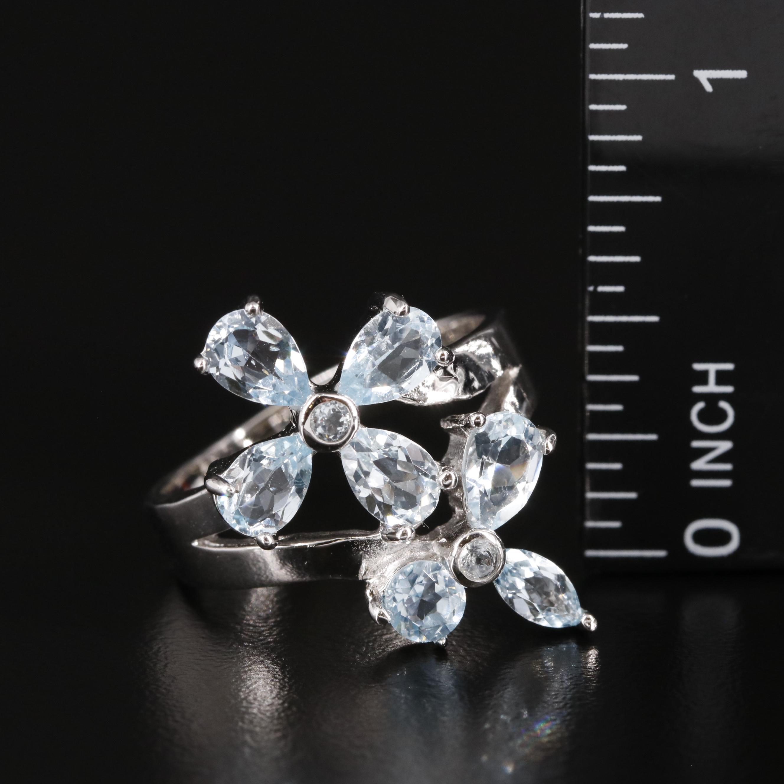 Sterling and Blue Topaz Floral Ring