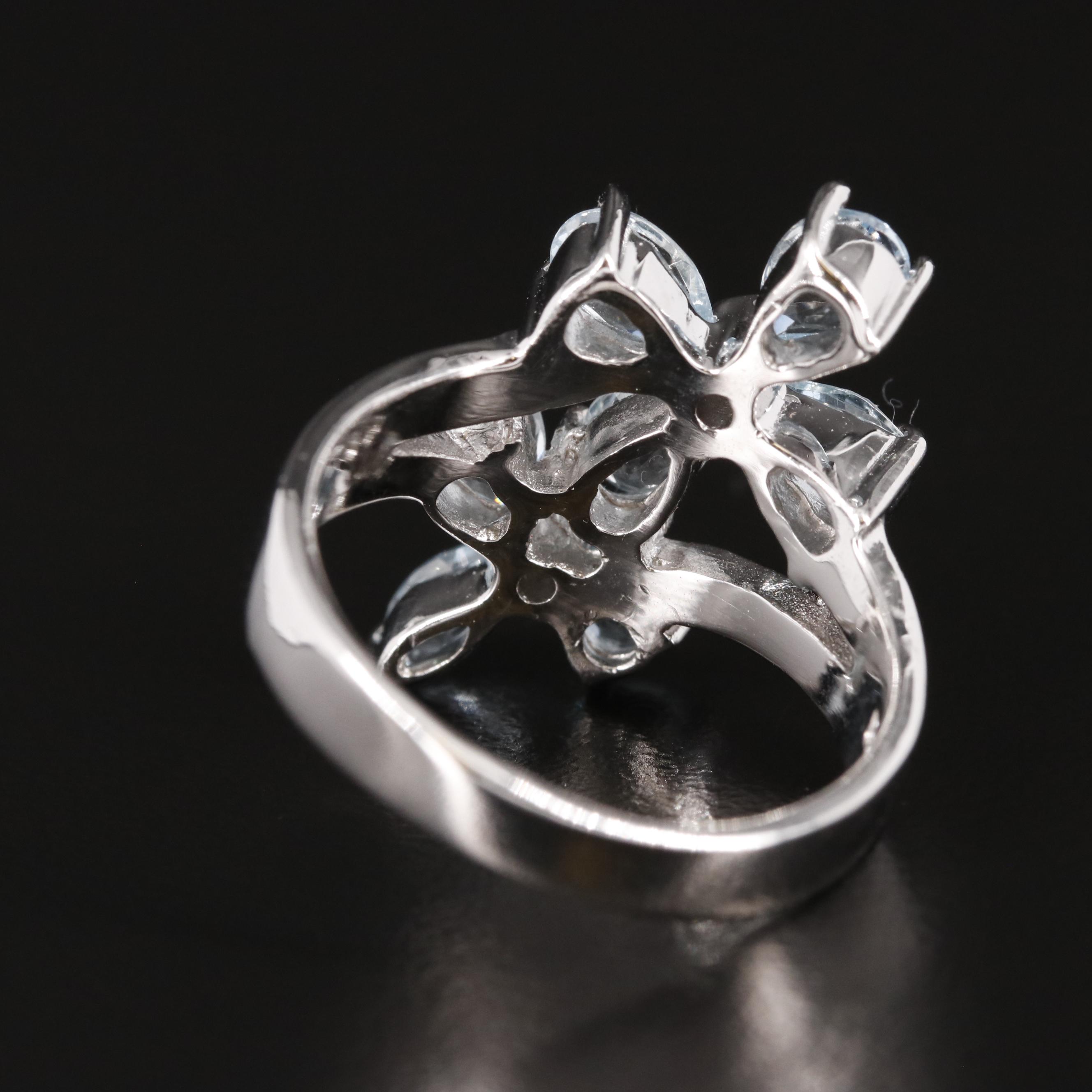Sterling and Blue Topaz Floral Ring