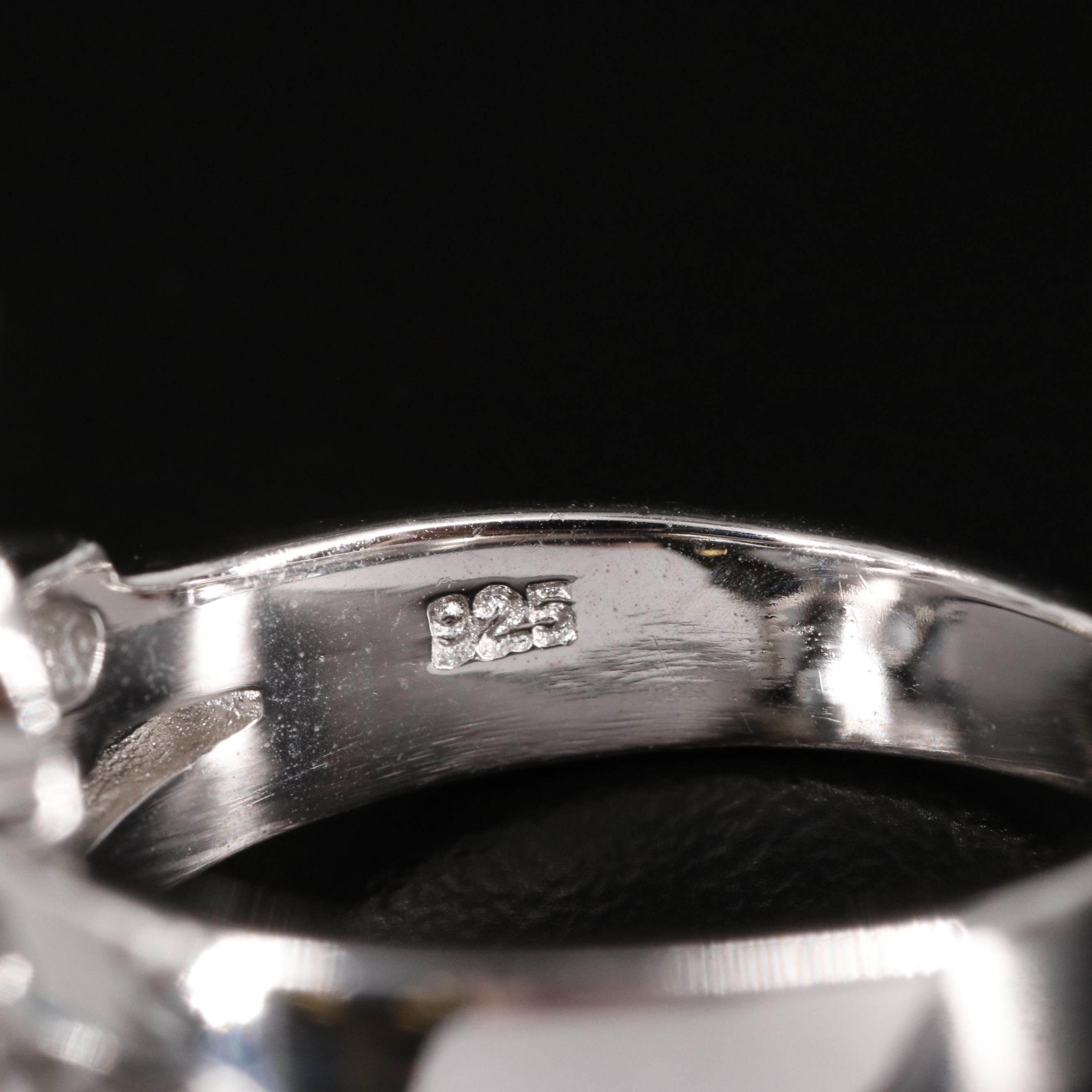 Sterling and Blue Topaz Floral Ring