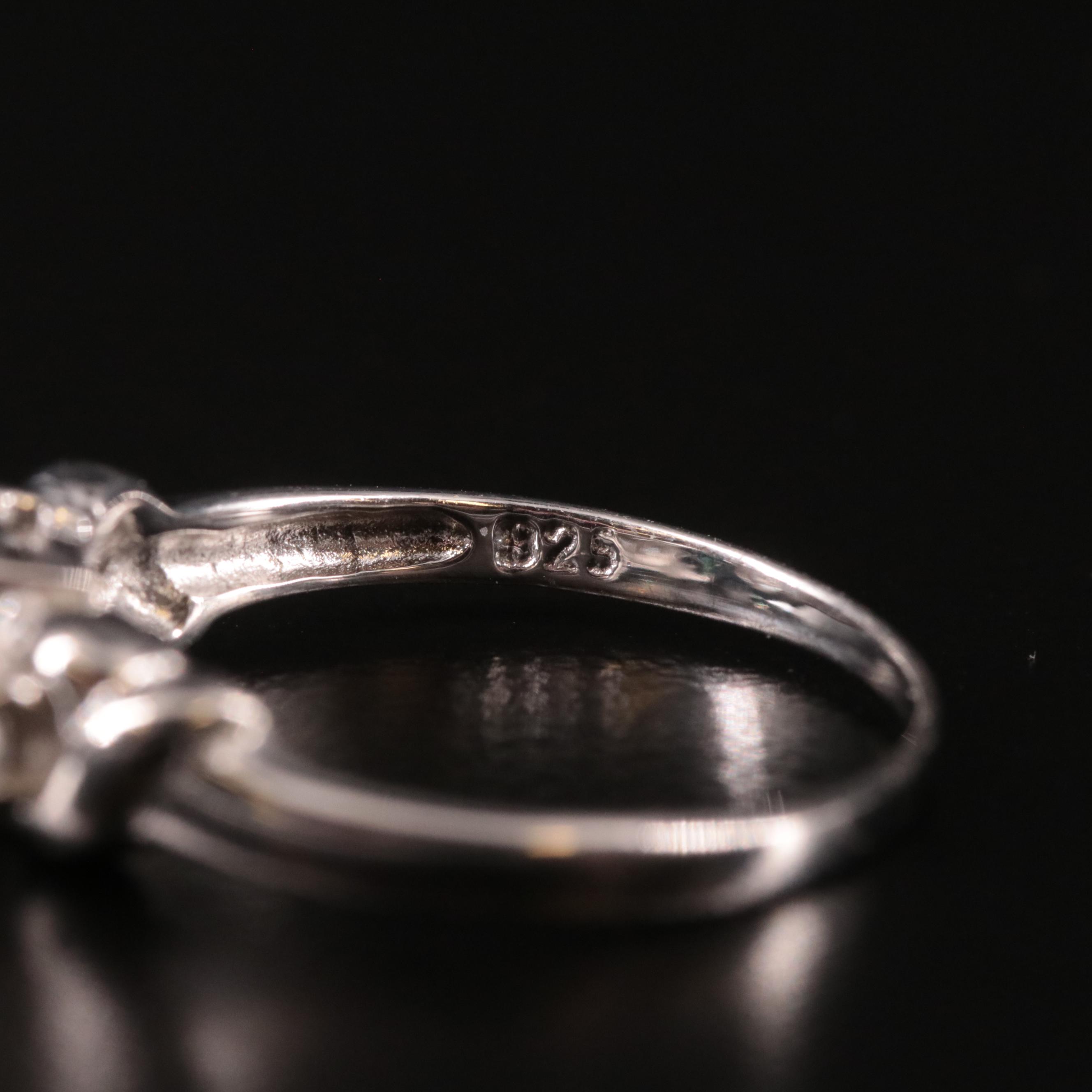 Sterling, Sapphire and White Topaz Ring