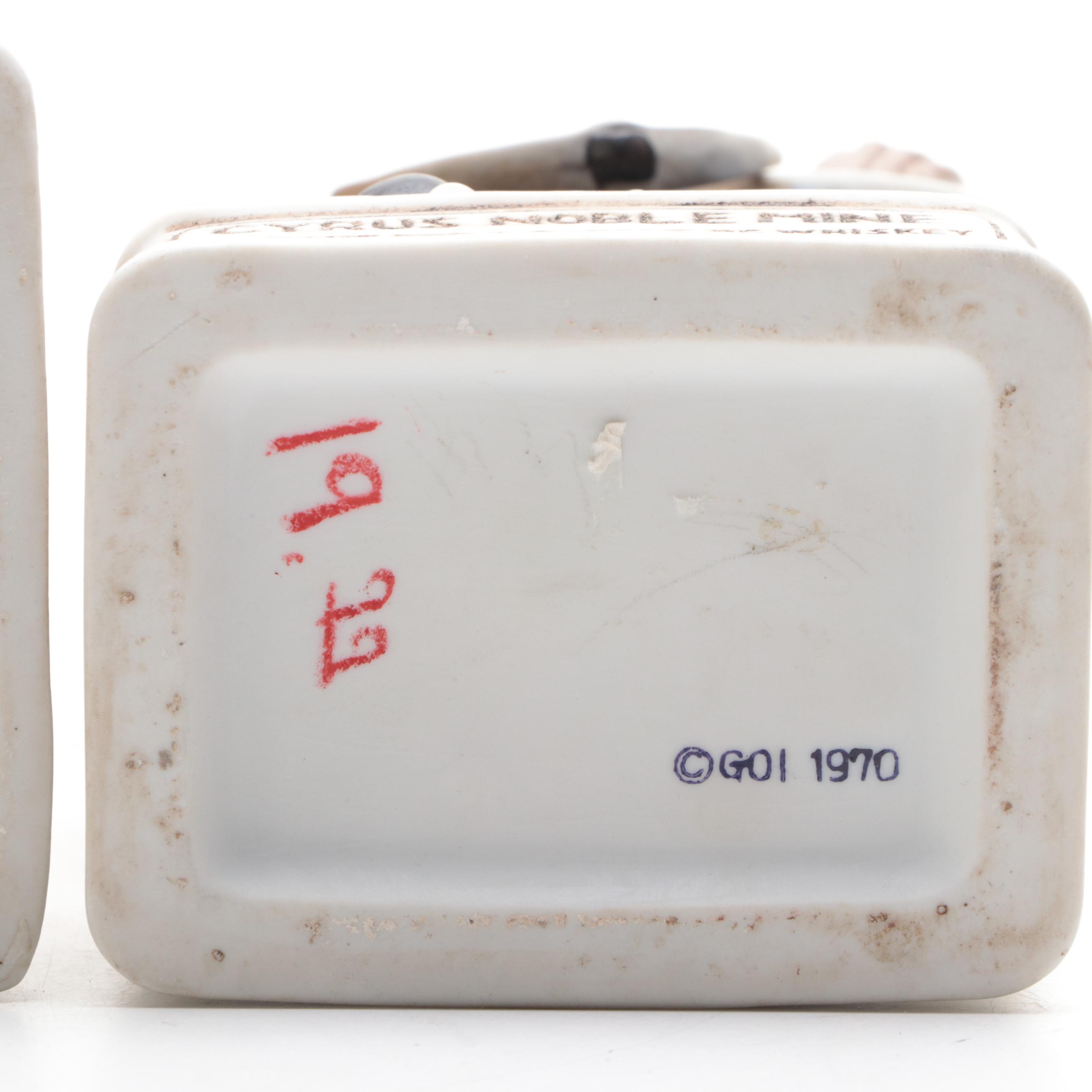 Lionstone and Cyrus Noble Mine Figural Porcelain Bisque Whiskey Decanters