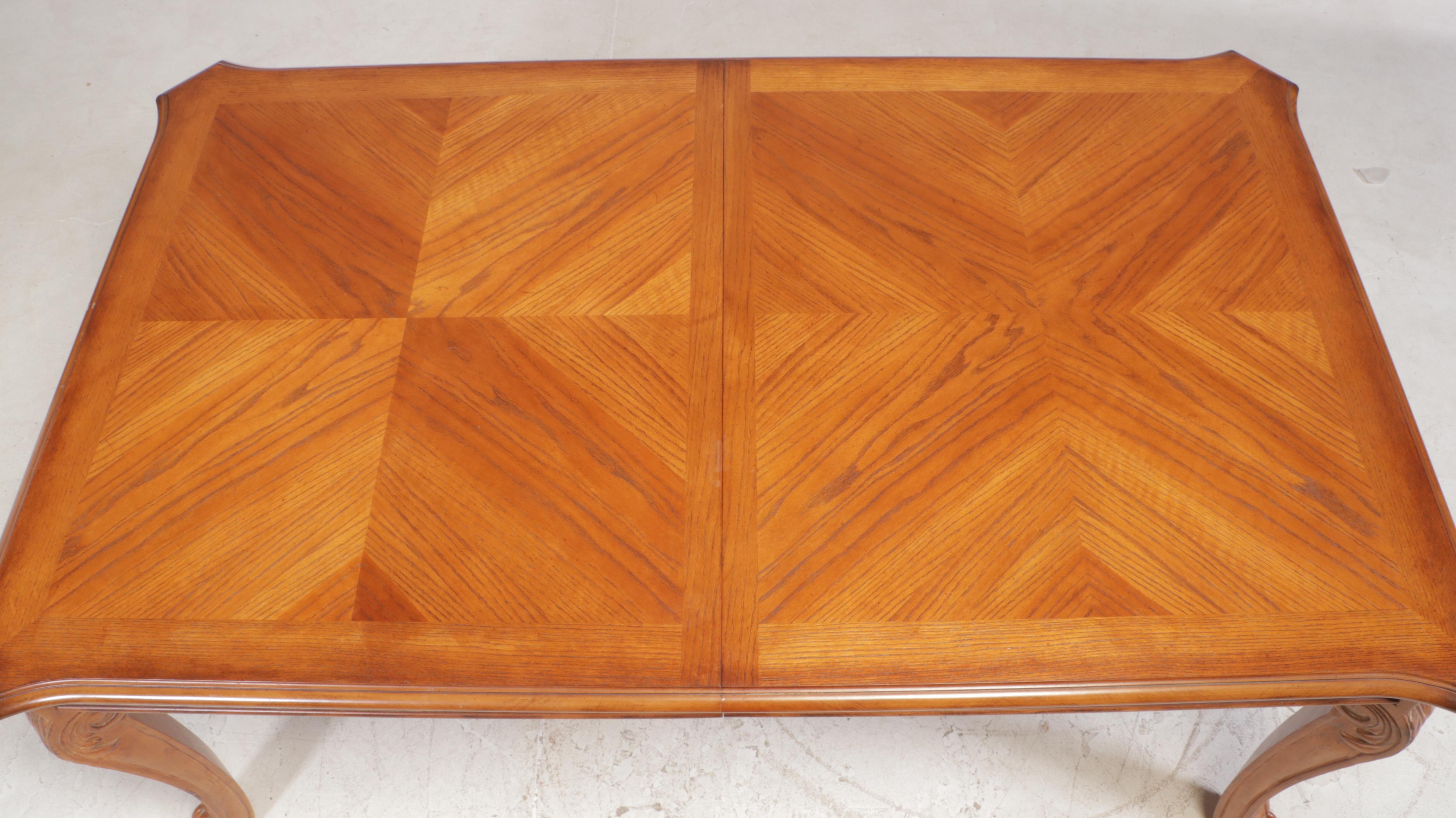 Ashley Furniture Carved Oak Dining Table and Eight Chairs, Late 20th Century