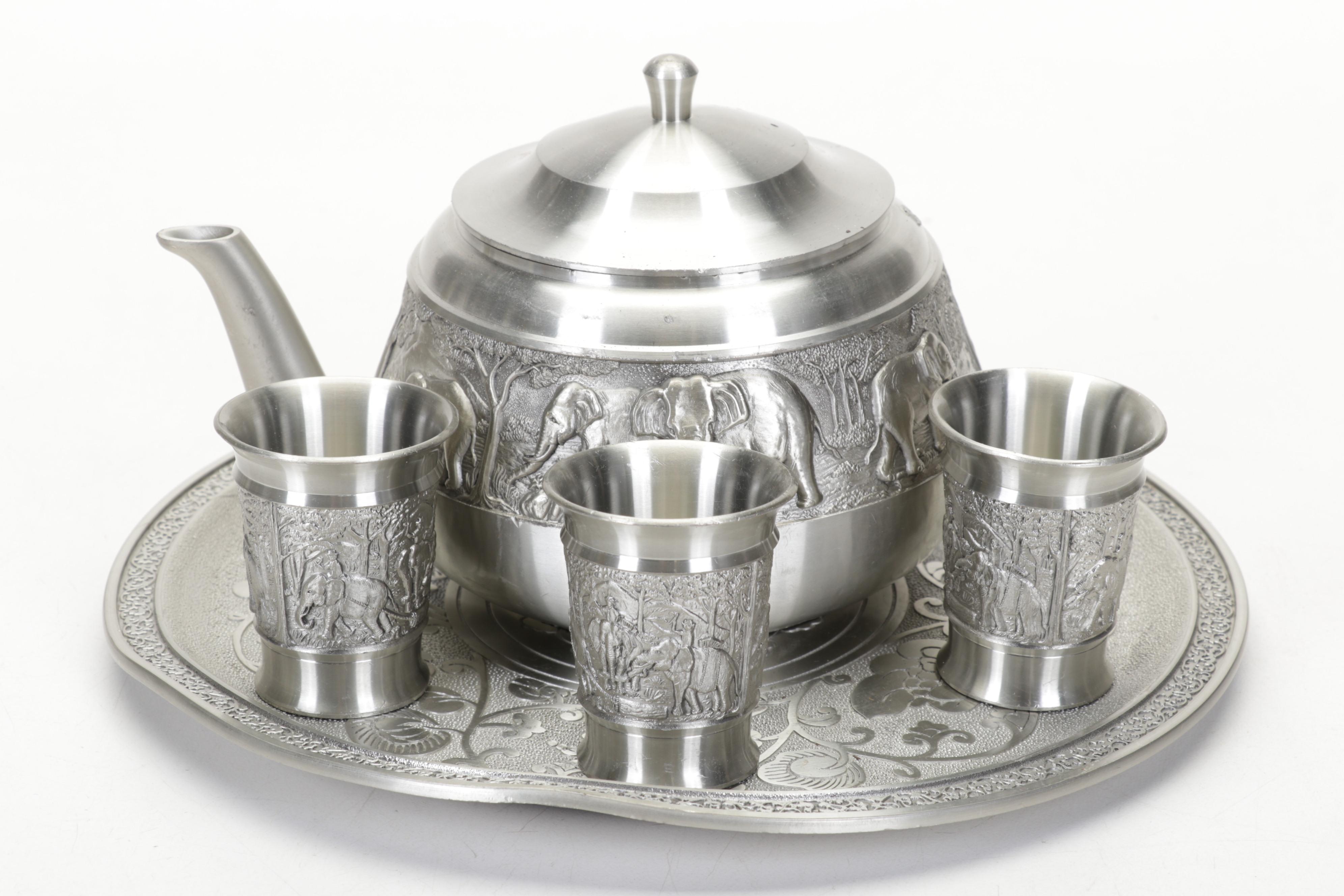 Dun Huang Silk Pillows, Ceramic Carpet Balls, Thai Pewter Tea Set and More