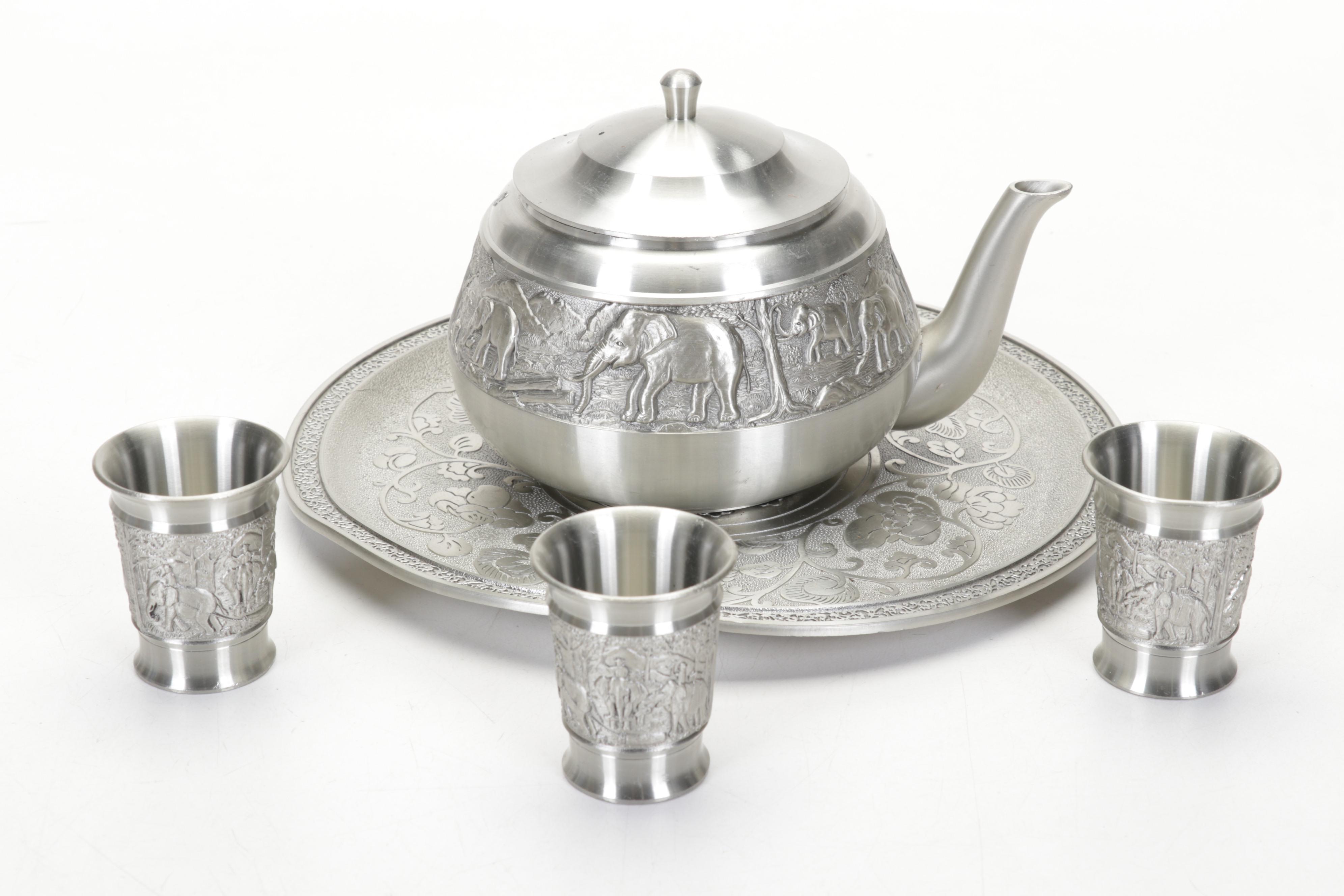 Dun Huang Silk Pillows, Ceramic Carpet Balls, Thai Pewter Tea Set and More