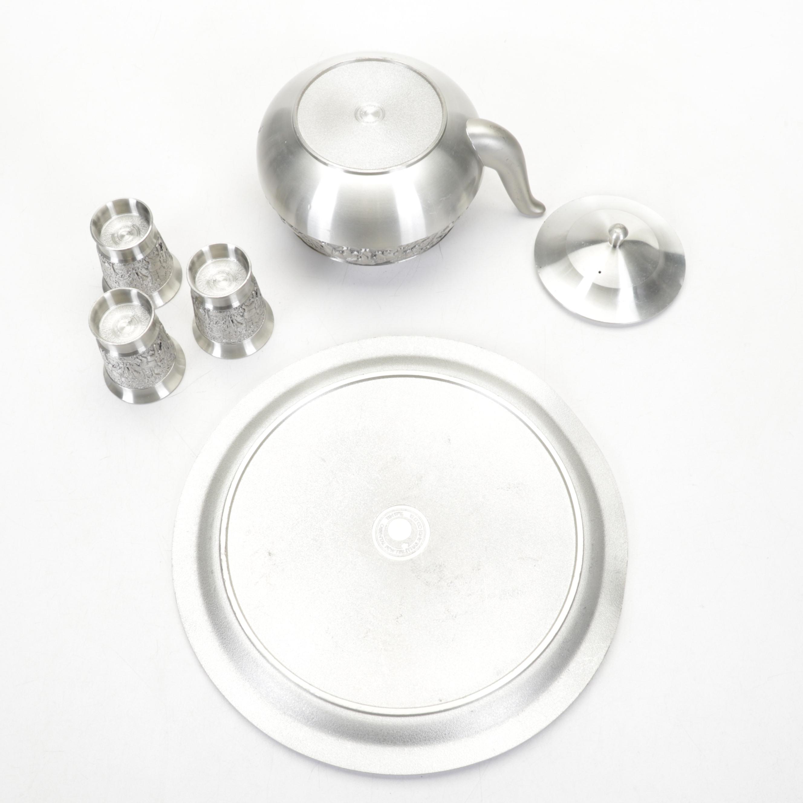 Dun Huang Silk Pillows, Ceramic Carpet Balls, Thai Pewter Tea Set and More