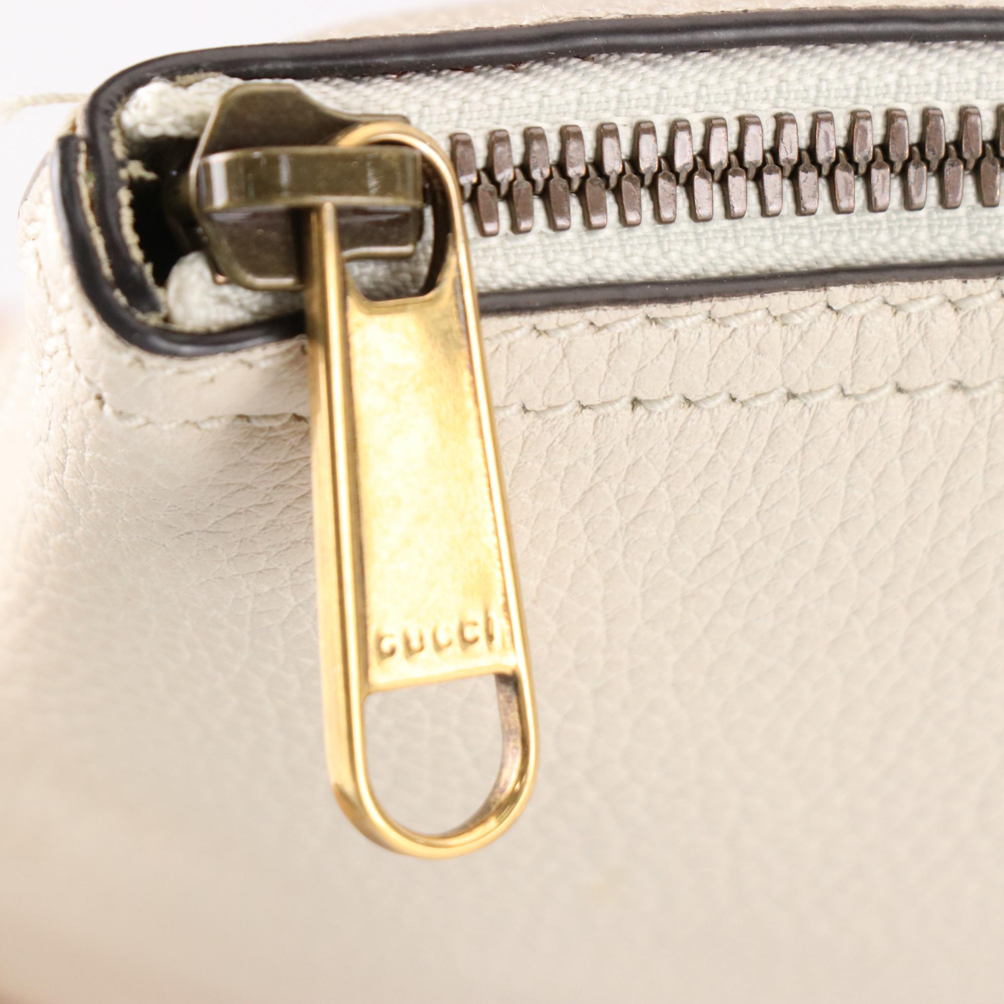 Gucci Zip Clutch in Logo Print Grain Leather