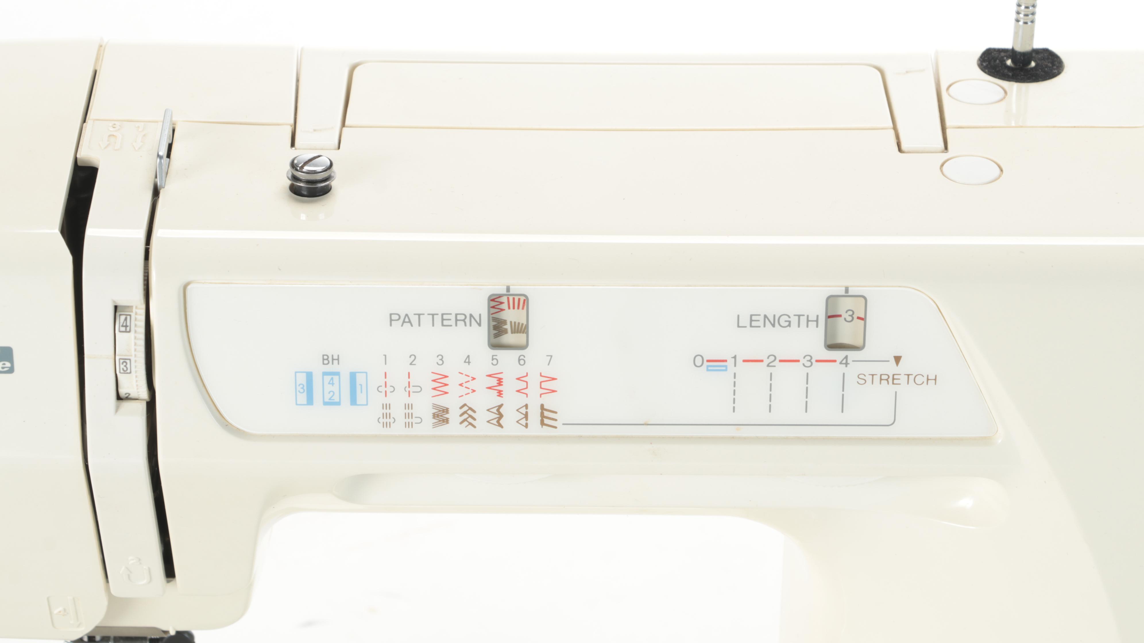 Kenmore Model 385 Electronic Sewing Machine with Thread, Needles and Accessories