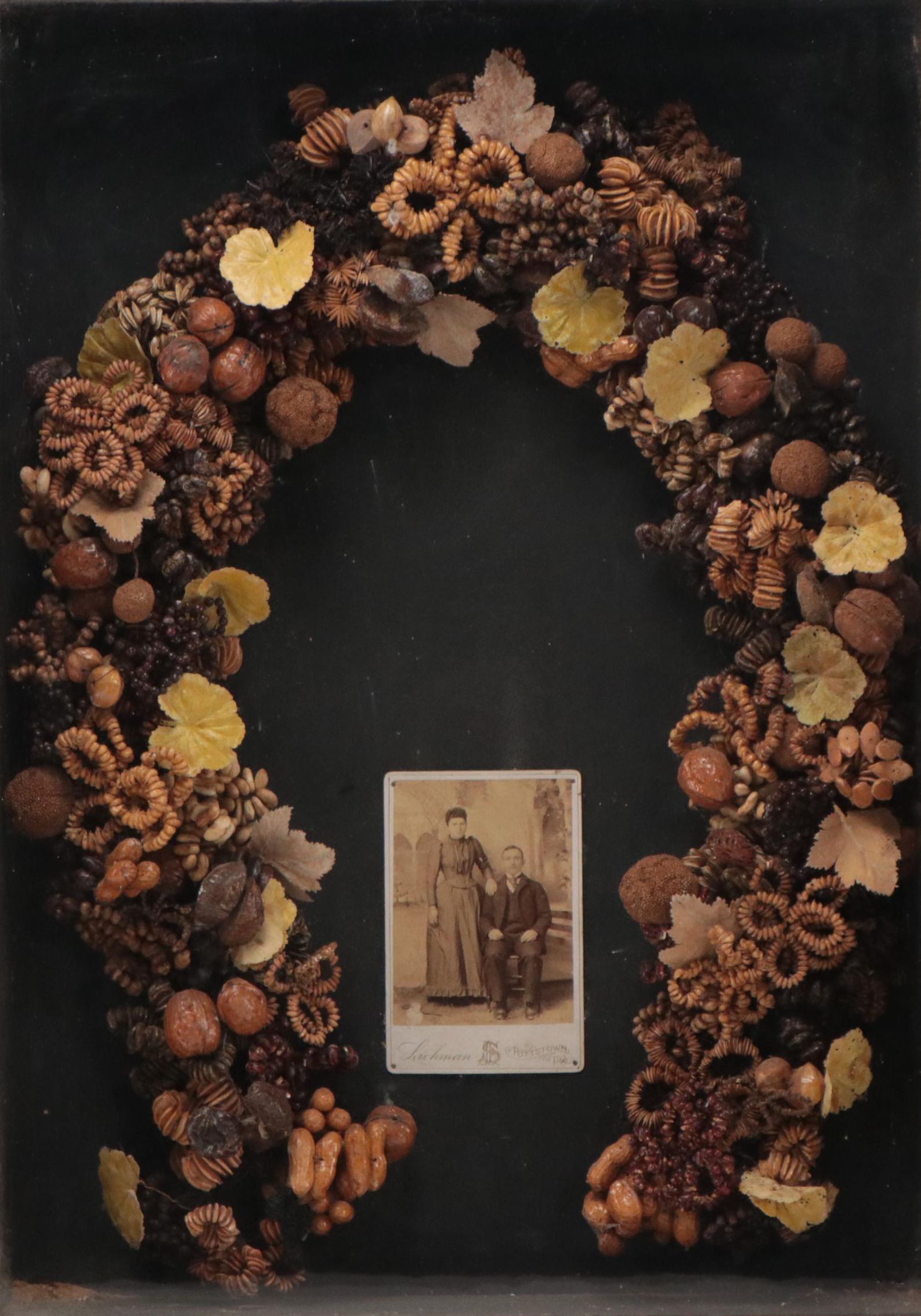 Albumen Photograph of a Couple With Wreath, Circa 1900