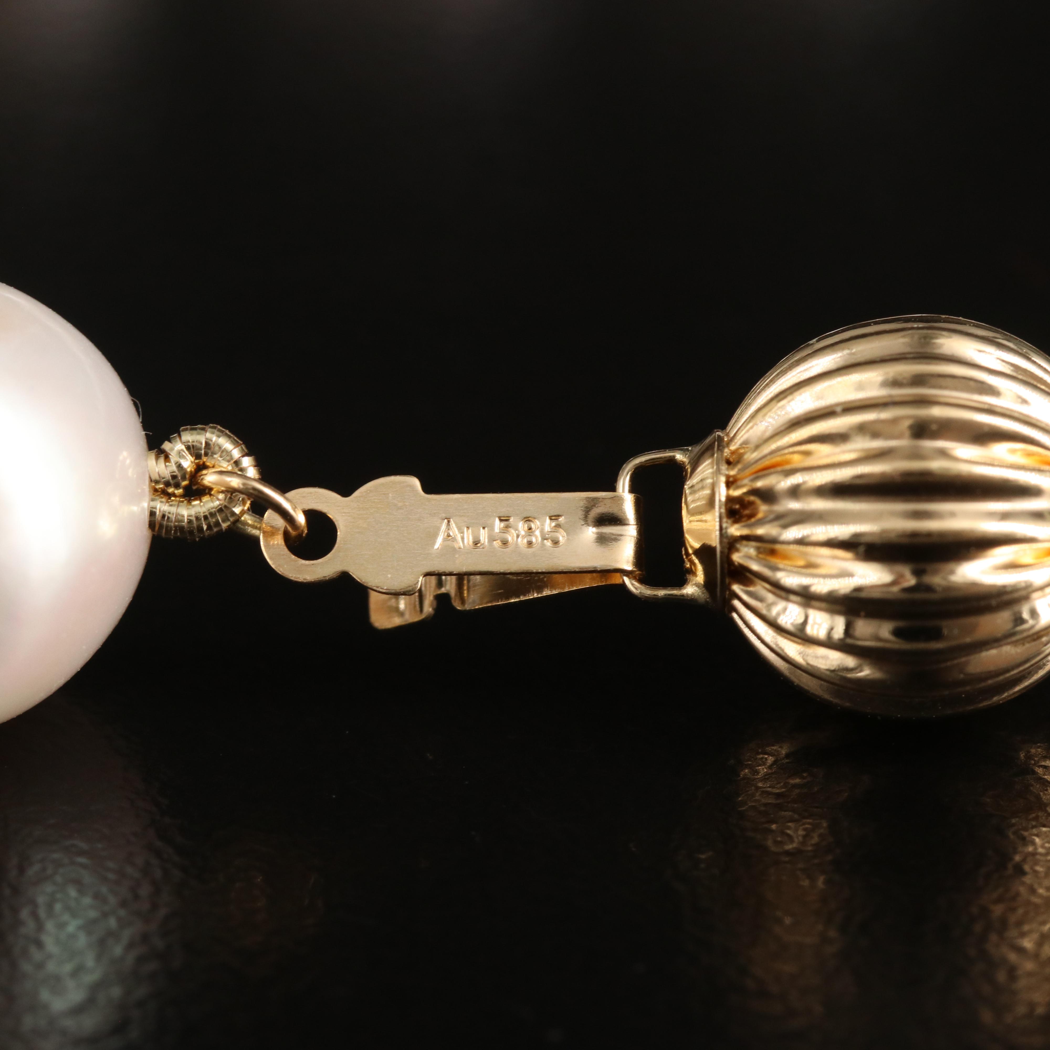 Graduated 11.00 - 14.00 mm Pearl Necklace with 14K Clasp