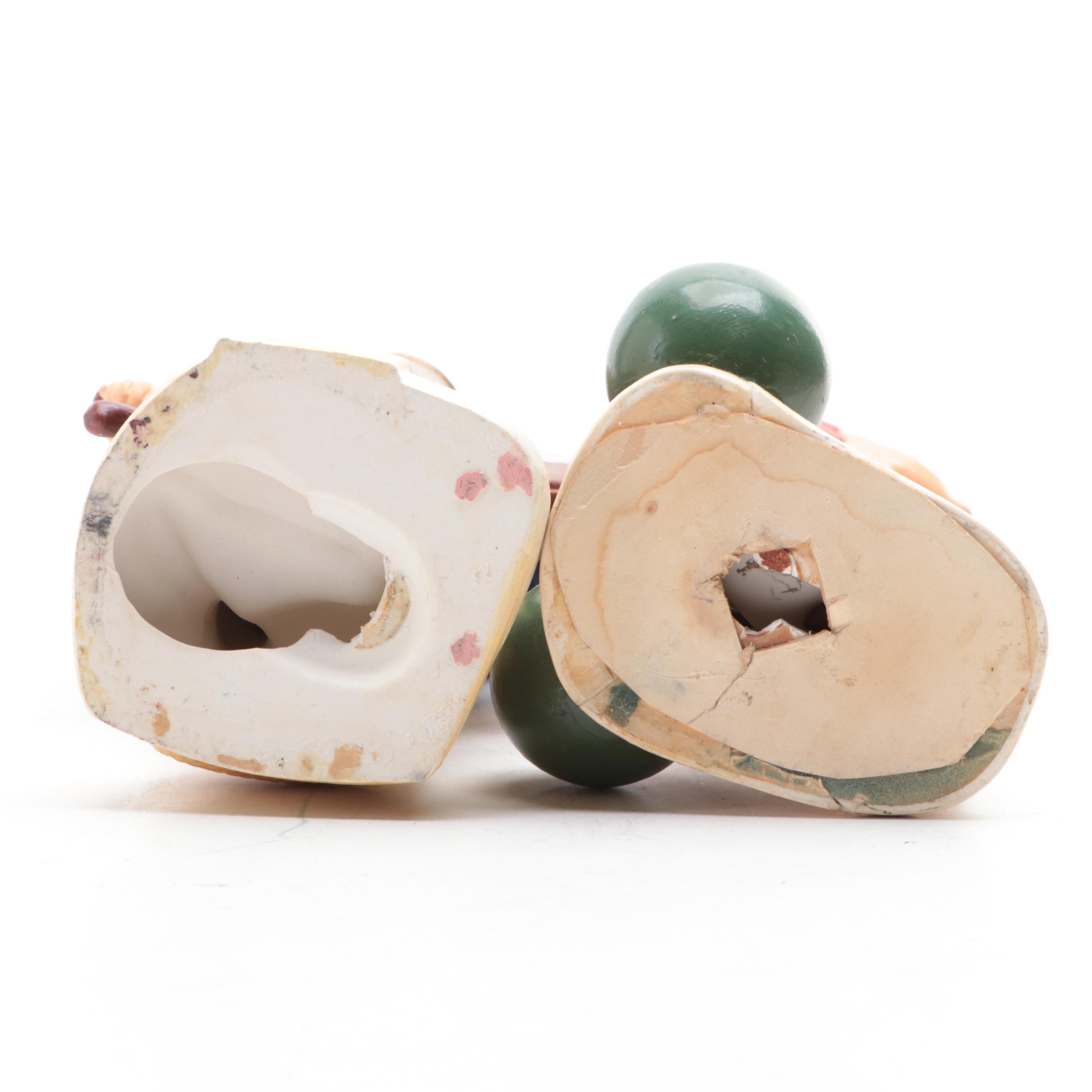 Painted Plaster "Antique Bourbon" Figures of Sea Captain and Strong Man