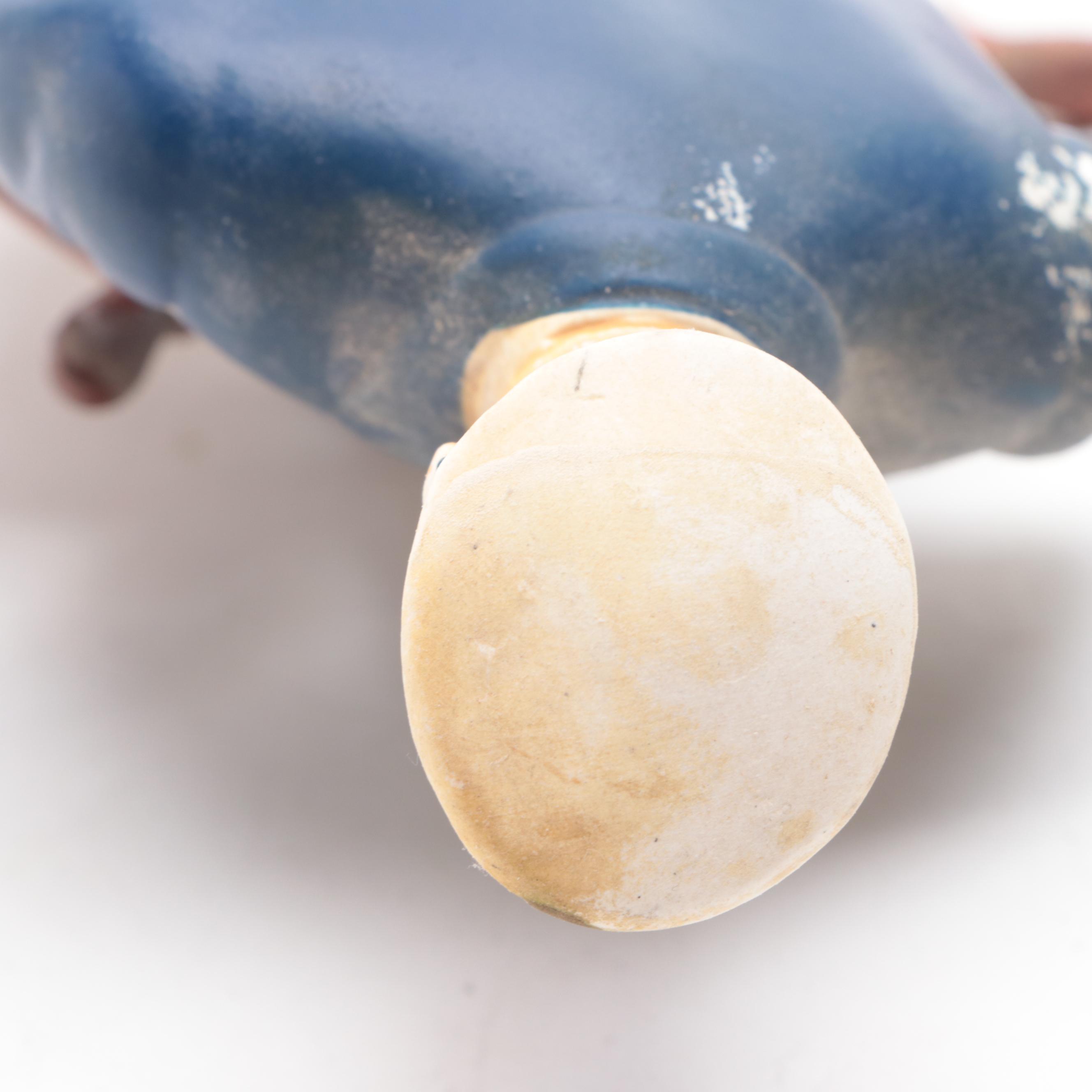 Painted Plaster "Antique Bourbon" Figures of Sea Captain and Strong Man