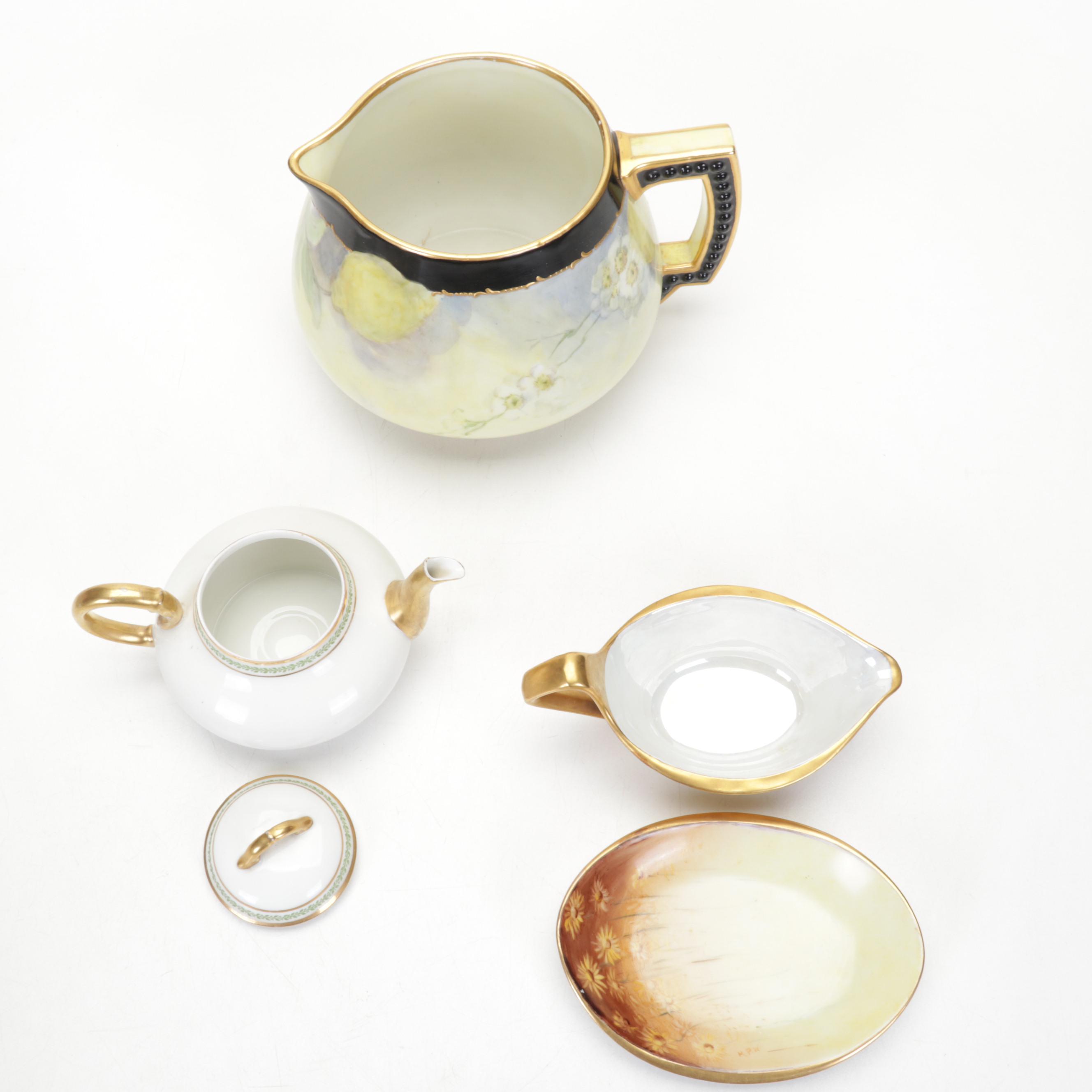 Limoges and Other Tableware with Royal Doulton "Top o' the Hill" Figurine