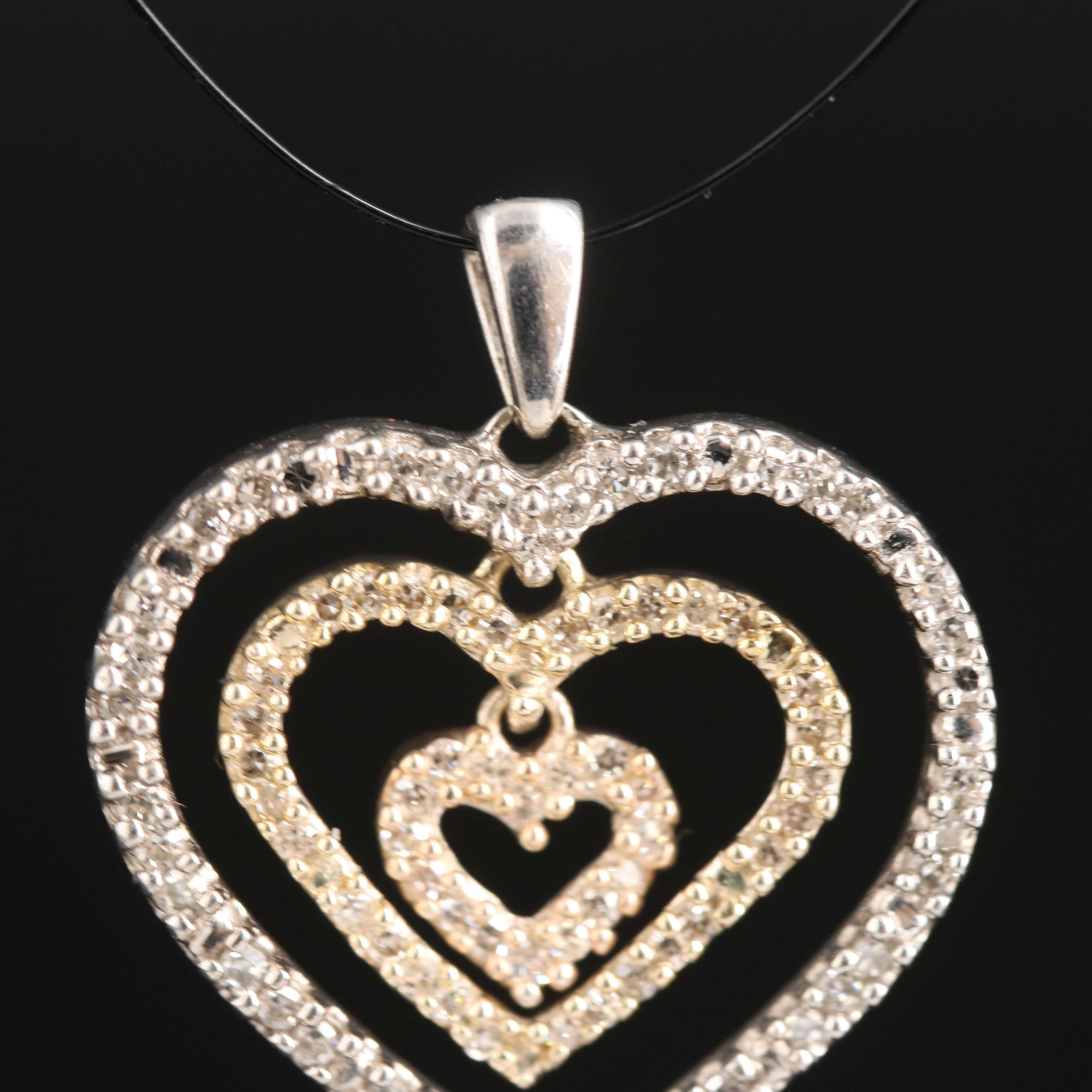 10K 0.33 CTW Diamond Heart Pendant