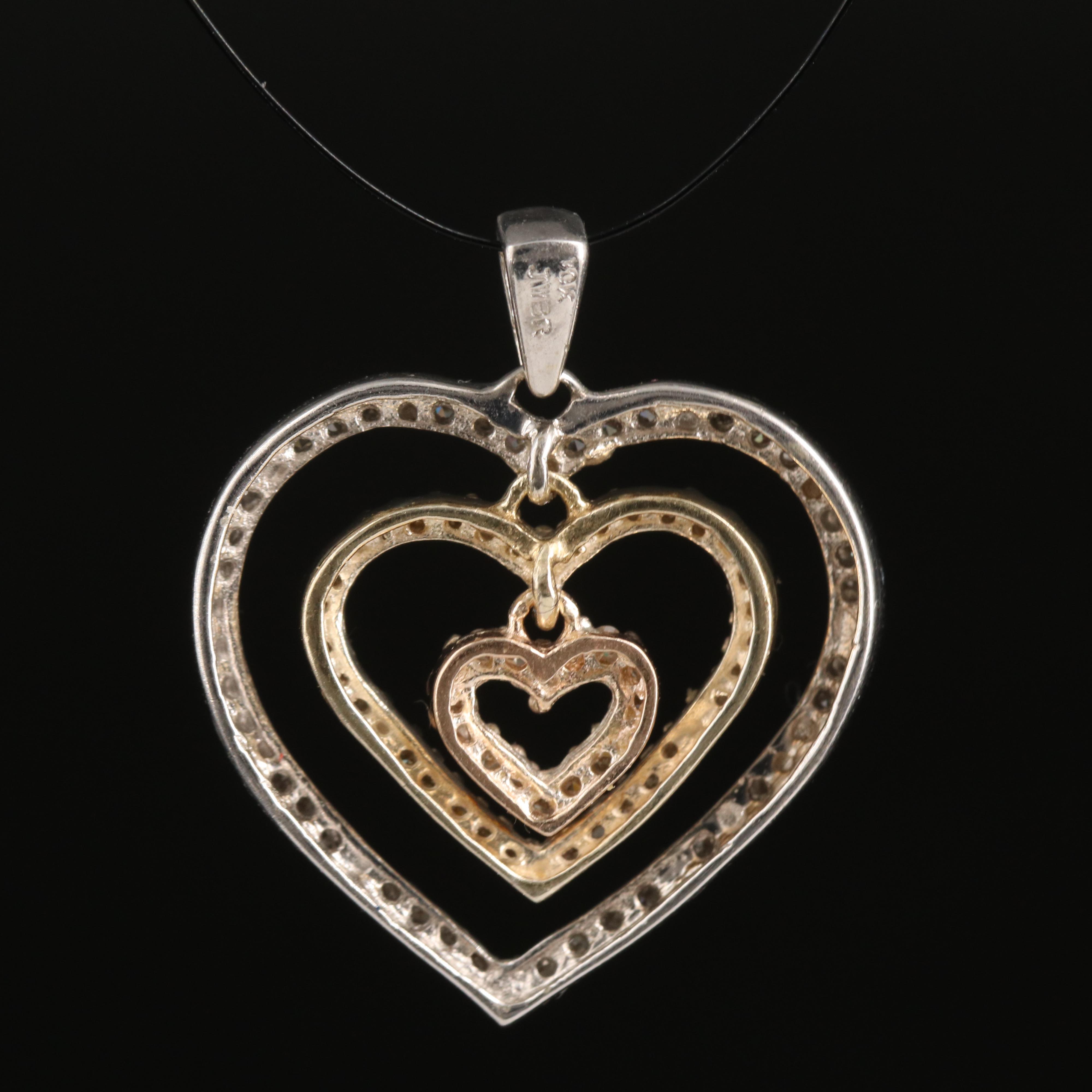 10K 0.33 CTW Diamond Heart Pendant