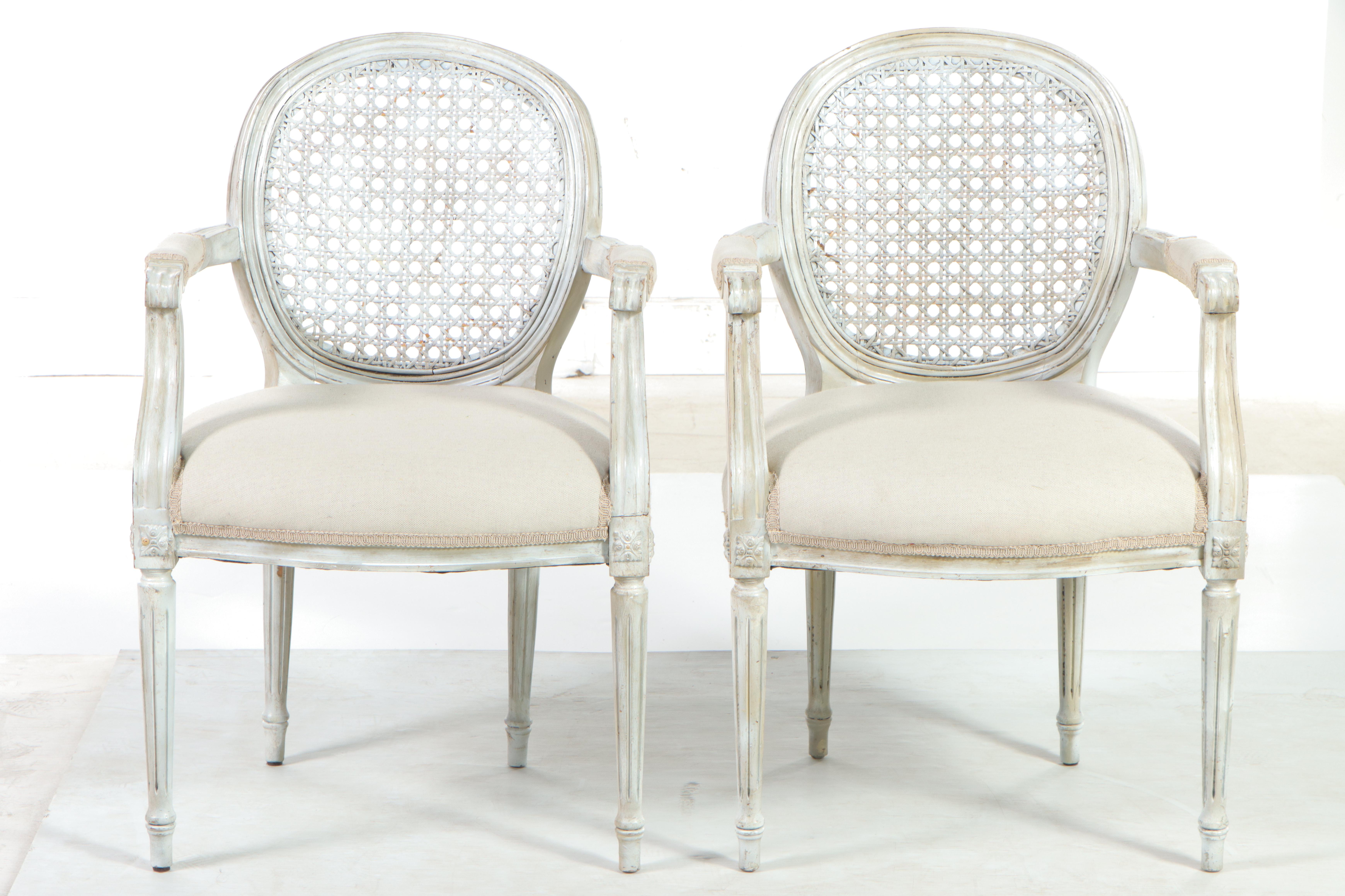 Pair of Gustavian Style White-Painted Wood and Caned Back Armchairs