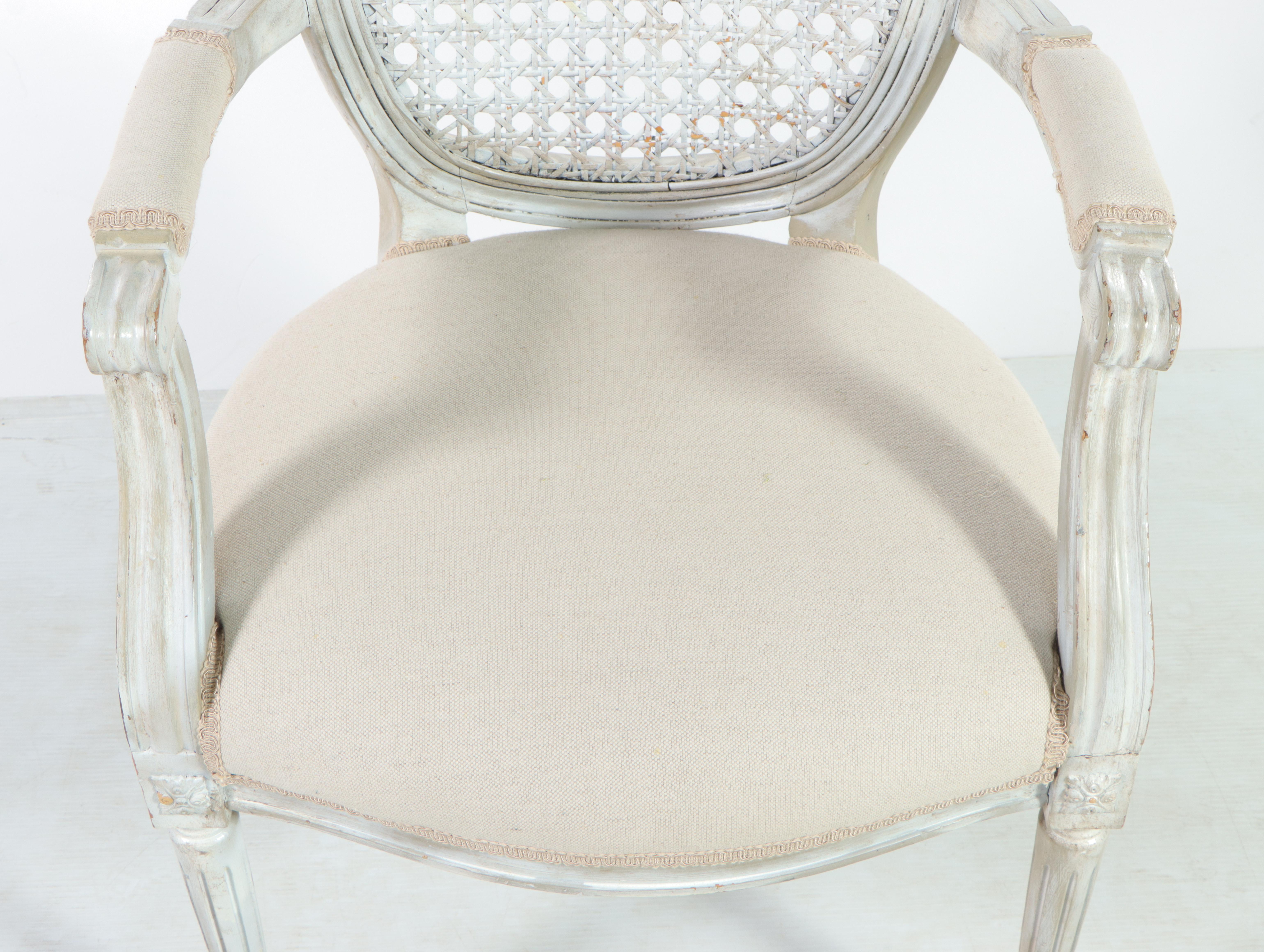 Pair of Gustavian Style White-Painted Wood and Caned Back Armchairs