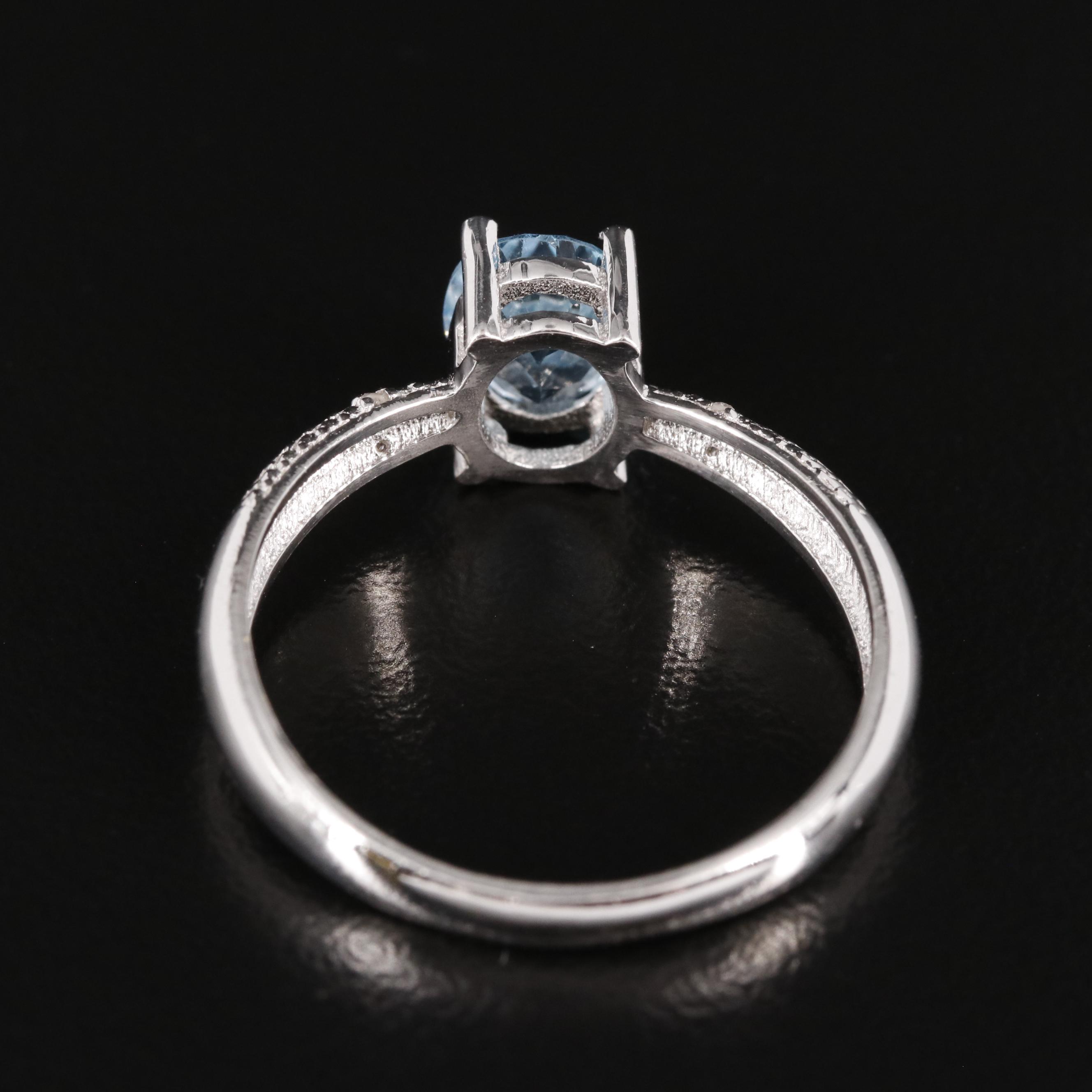 Sterling Blue Topaz Ring with Diamond Accents