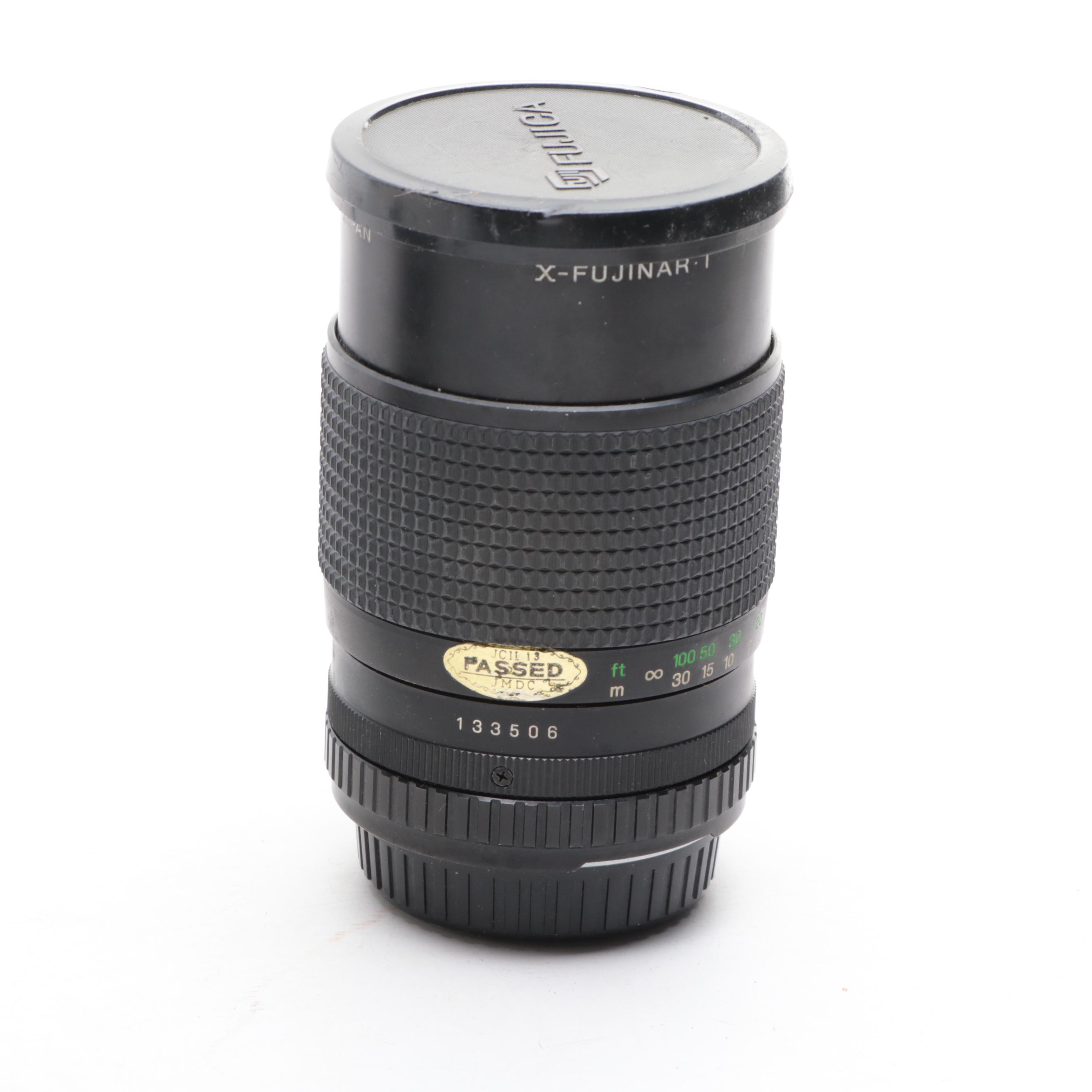 Fujica STX-1 SLR Camera with Case, Flashes, Lens and More Accessories