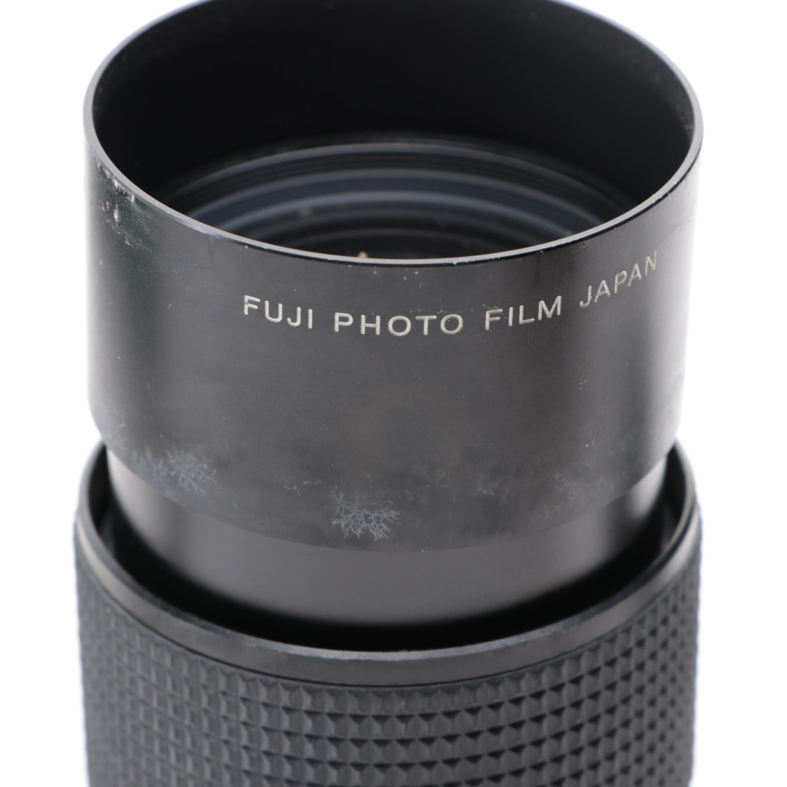 Fujica STX-1 SLR Camera with Case, Flashes, Lens and More Accessories