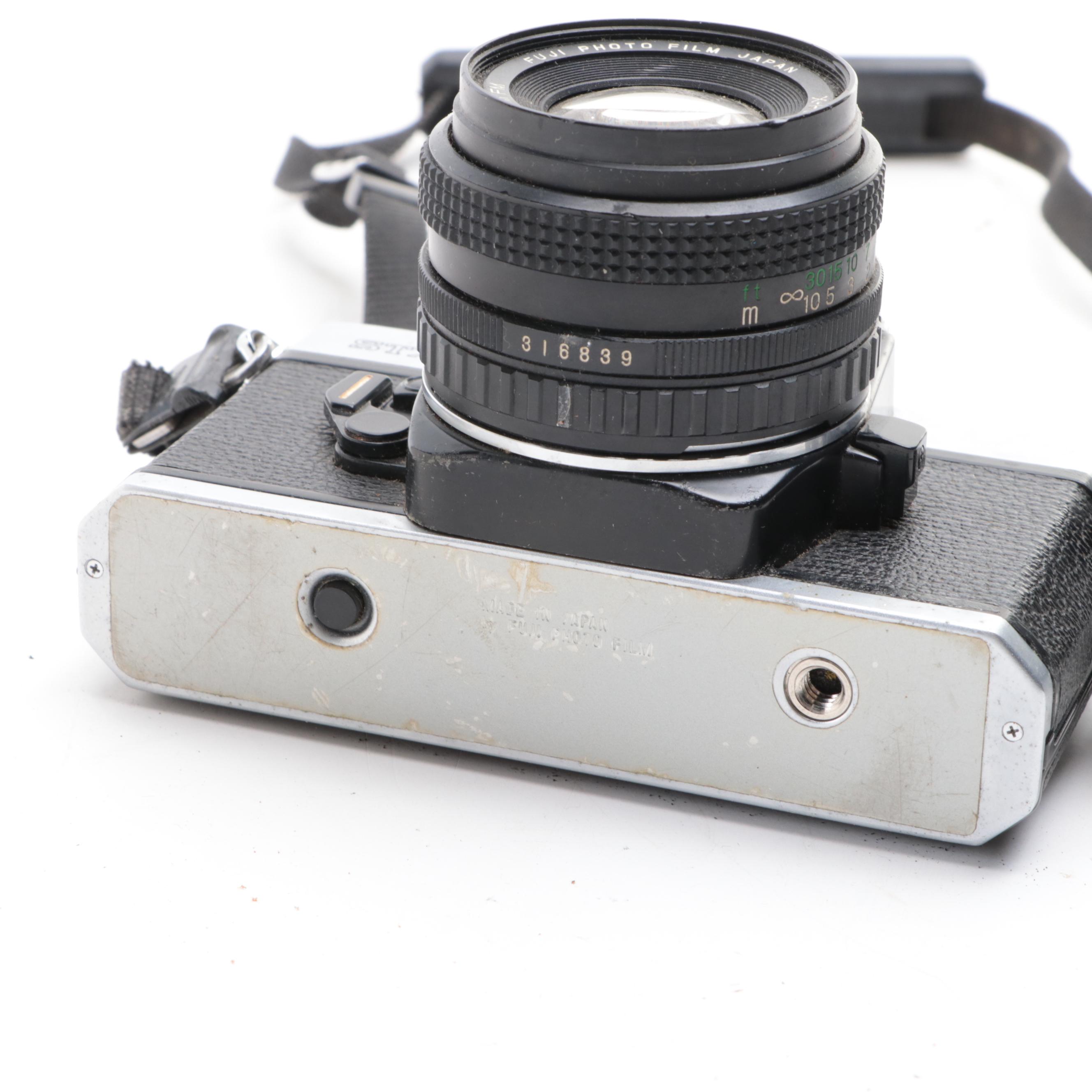 Fujica STX-1 SLR Camera with Case, Flashes, Lens and More Accessories