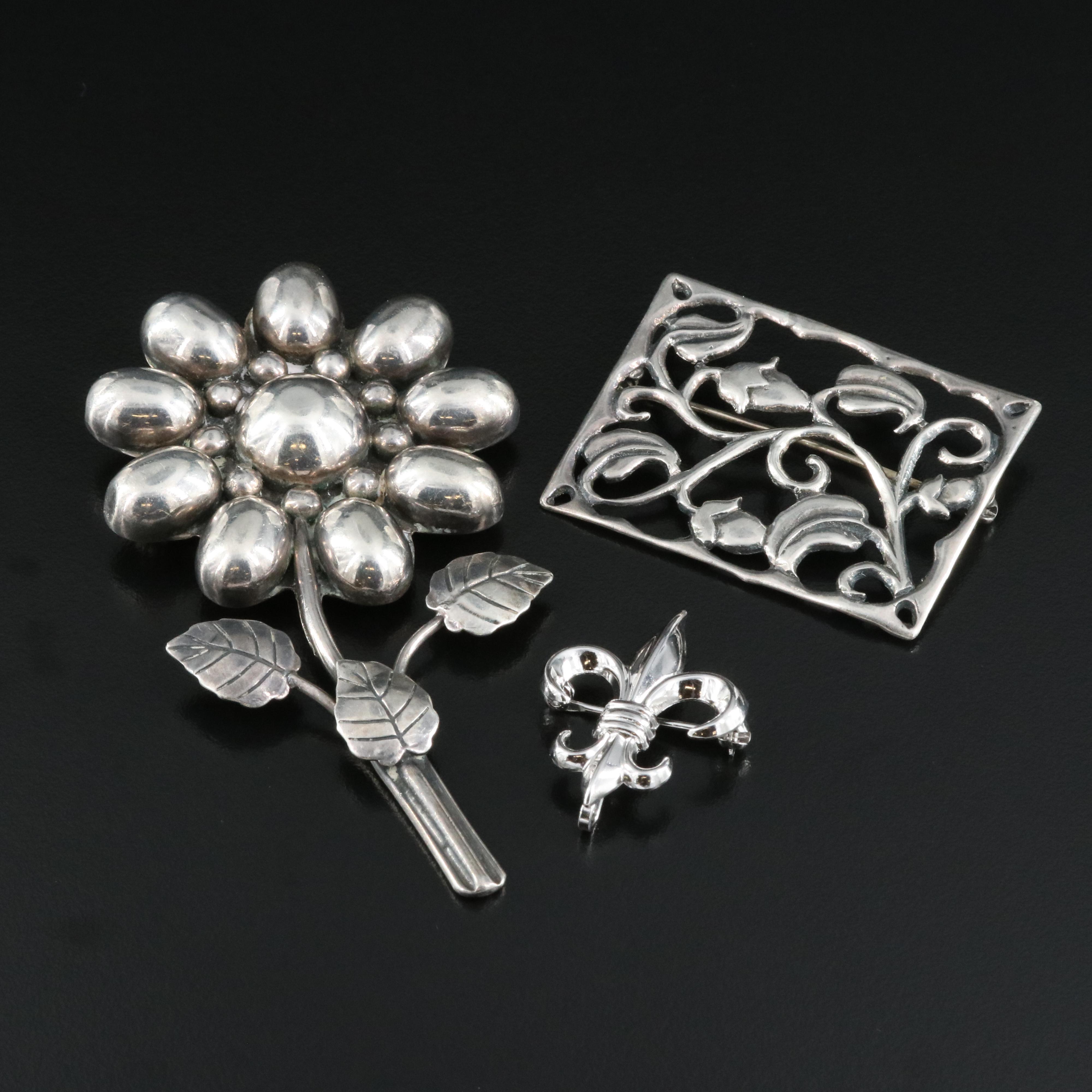Sterling Brooches Including Fleur-de-Lis, Floral and Foliate