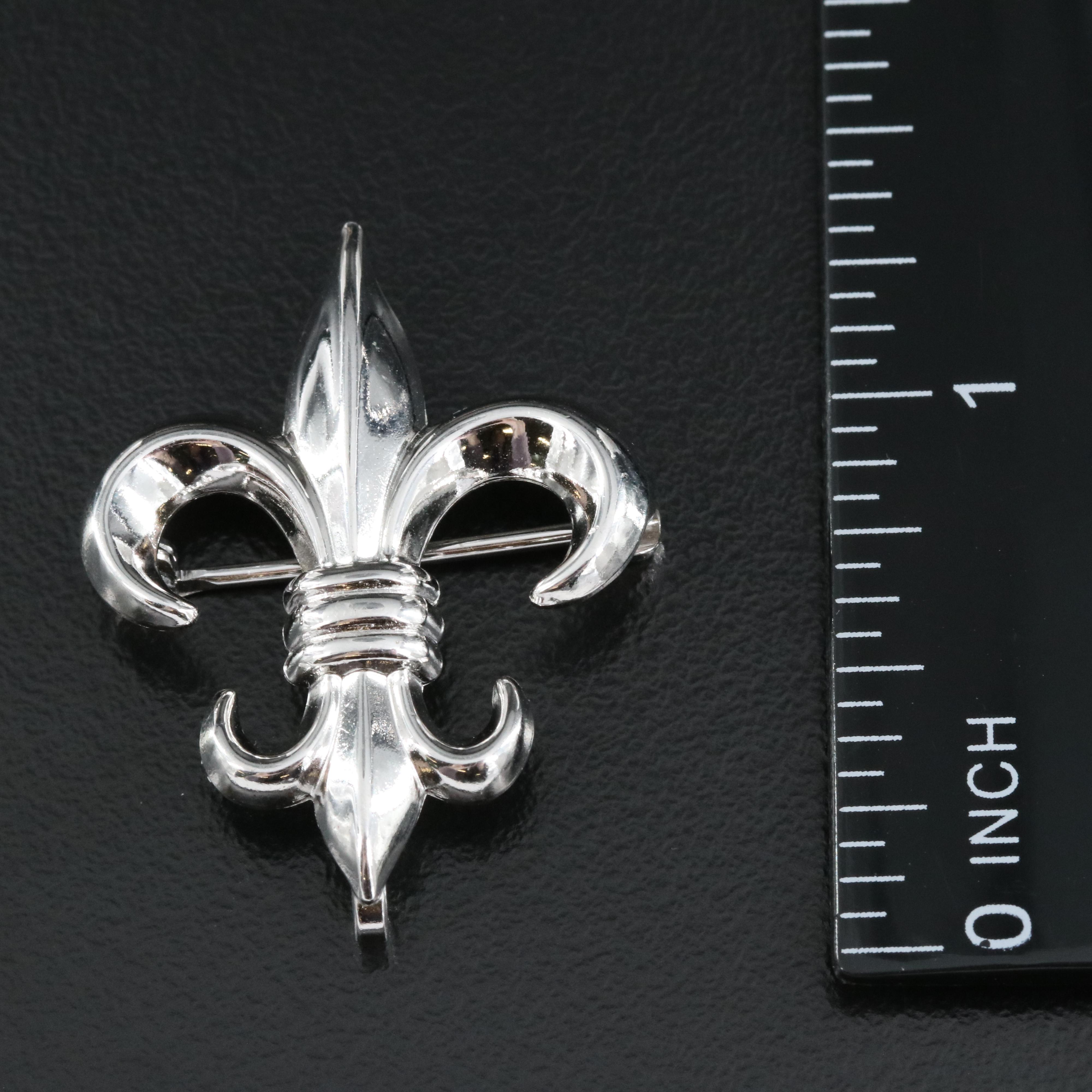 Sterling Brooches Including Fleur-de-Lis, Floral and Foliate