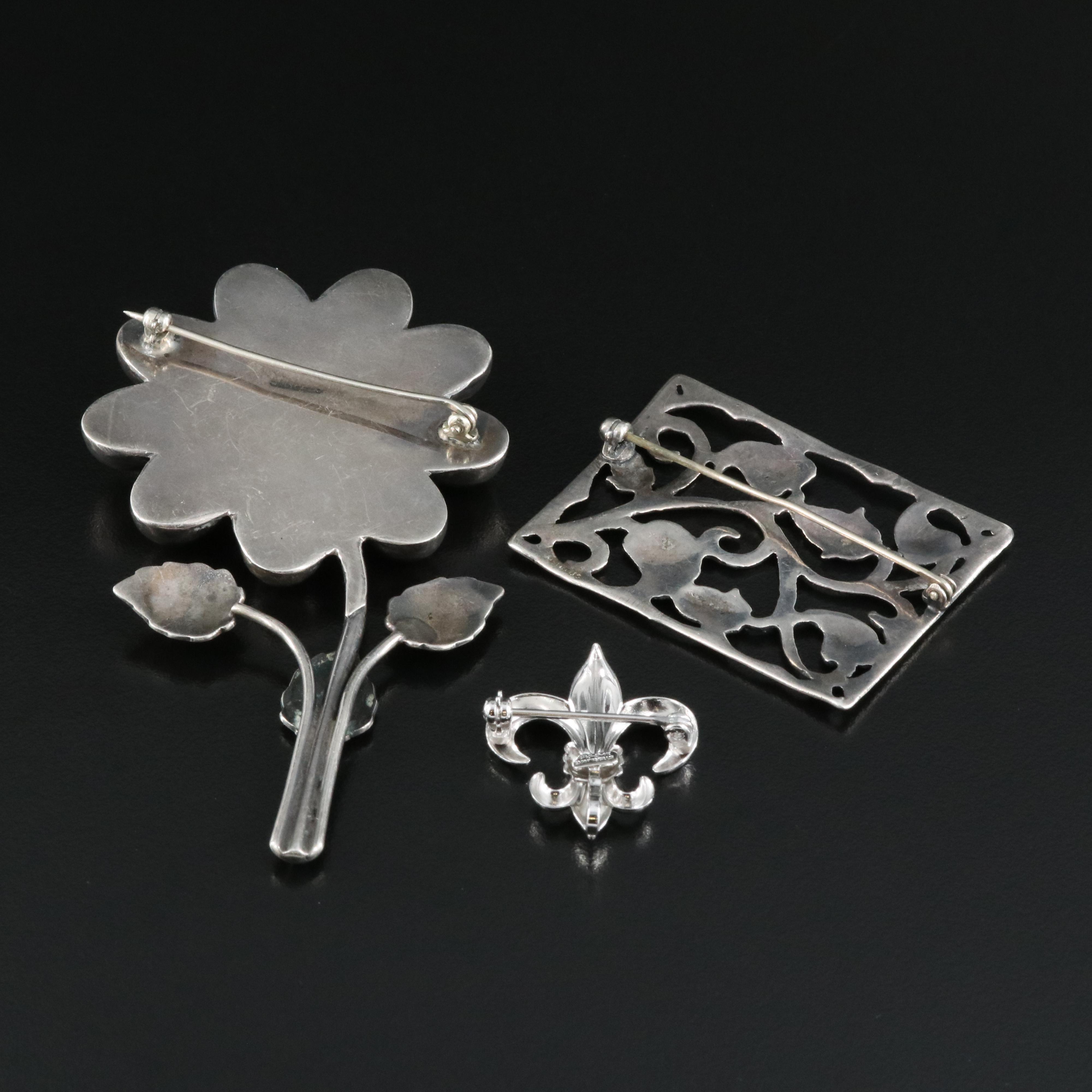 Sterling Brooches Including Fleur-de-Lis, Floral and Foliate