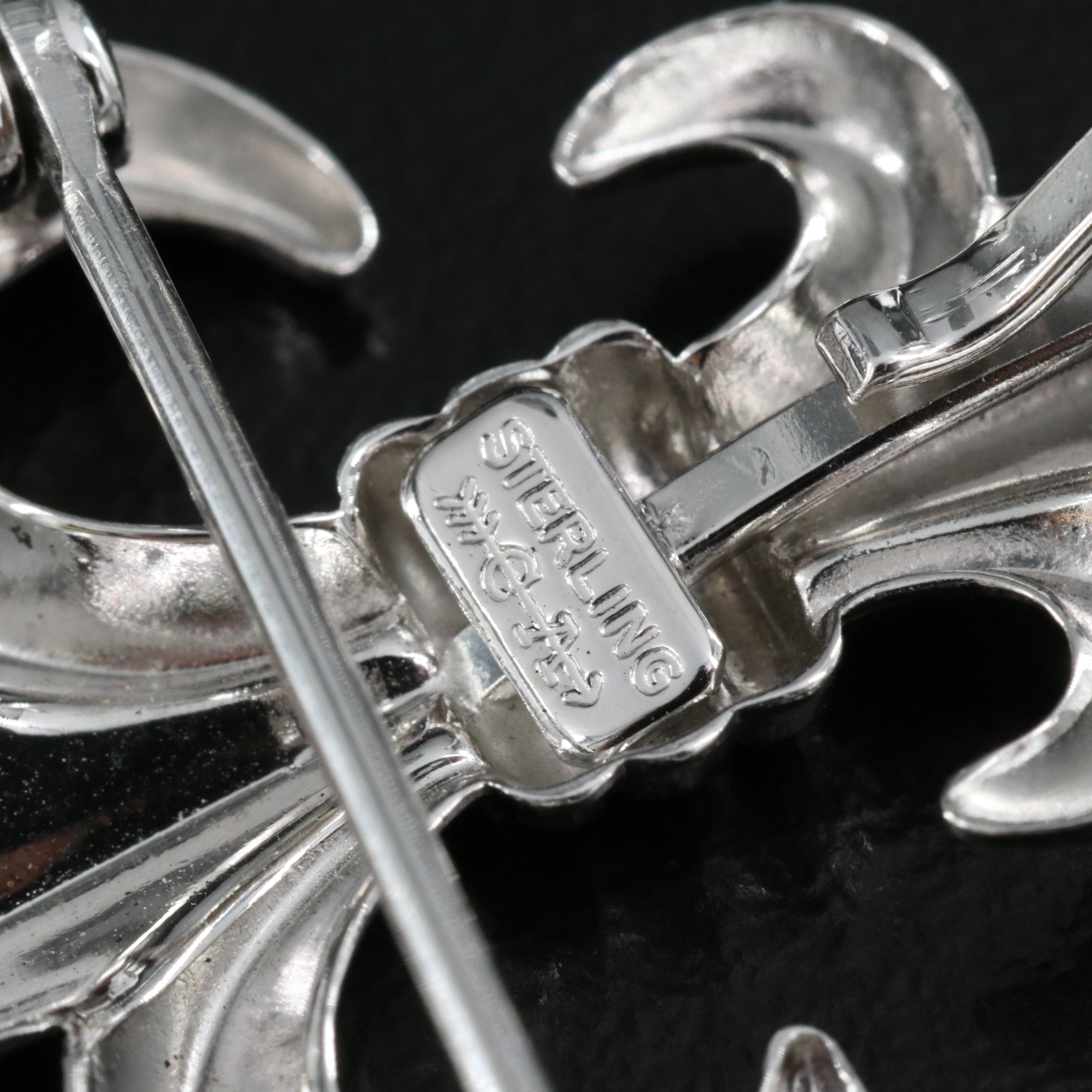 Sterling Brooches Including Fleur-de-Lis, Floral and Foliate