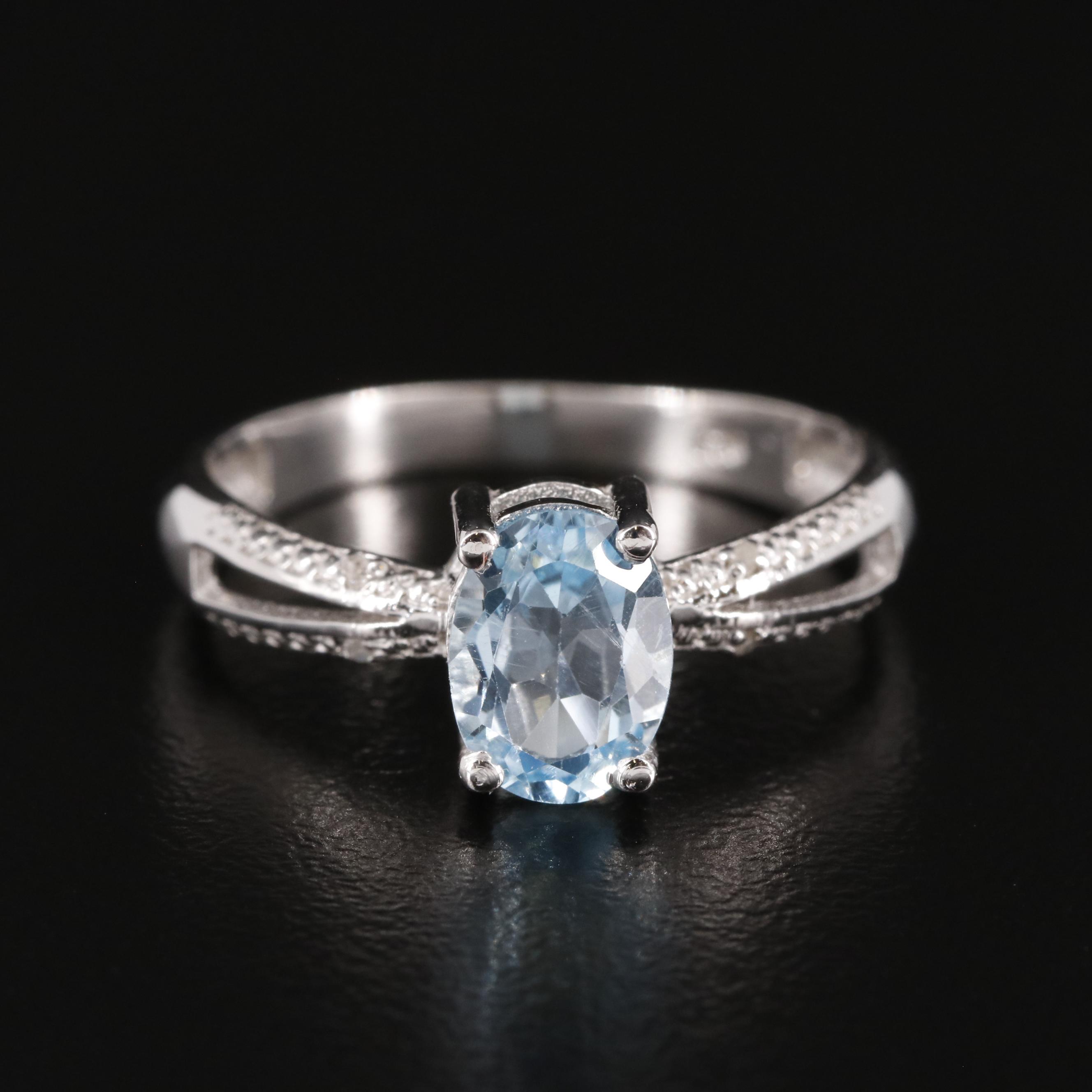 Sterling Blue Topaz Ring with Diamond Accents