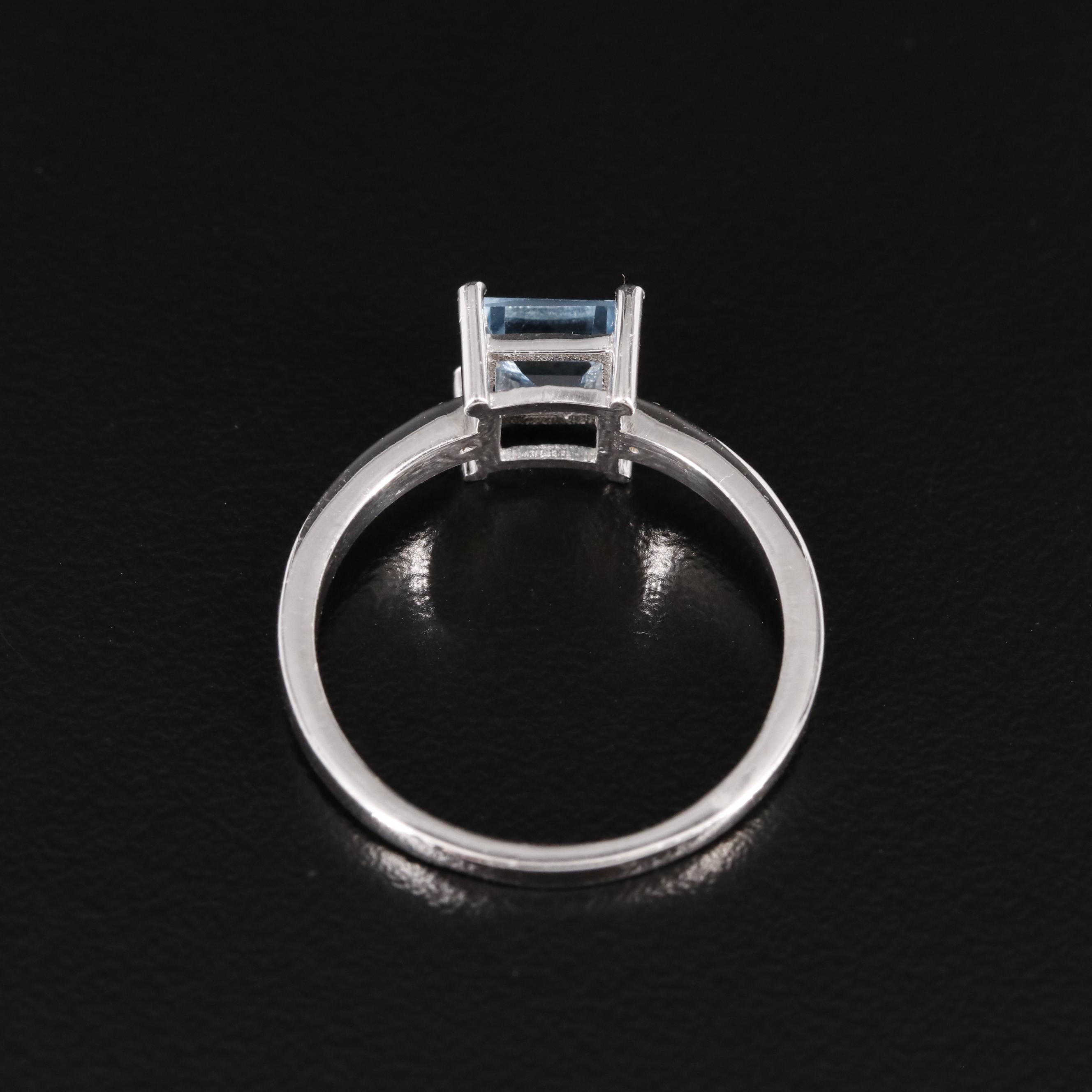 Sterling Blue Topaz Ring with Diamond Accents