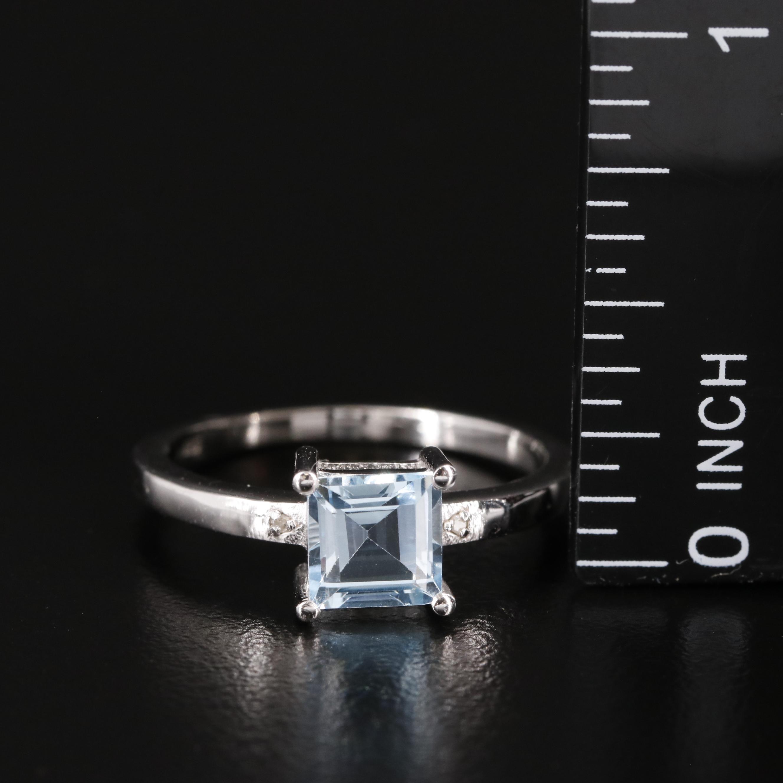 Sterling Blue Topaz Ring with Diamond Accents