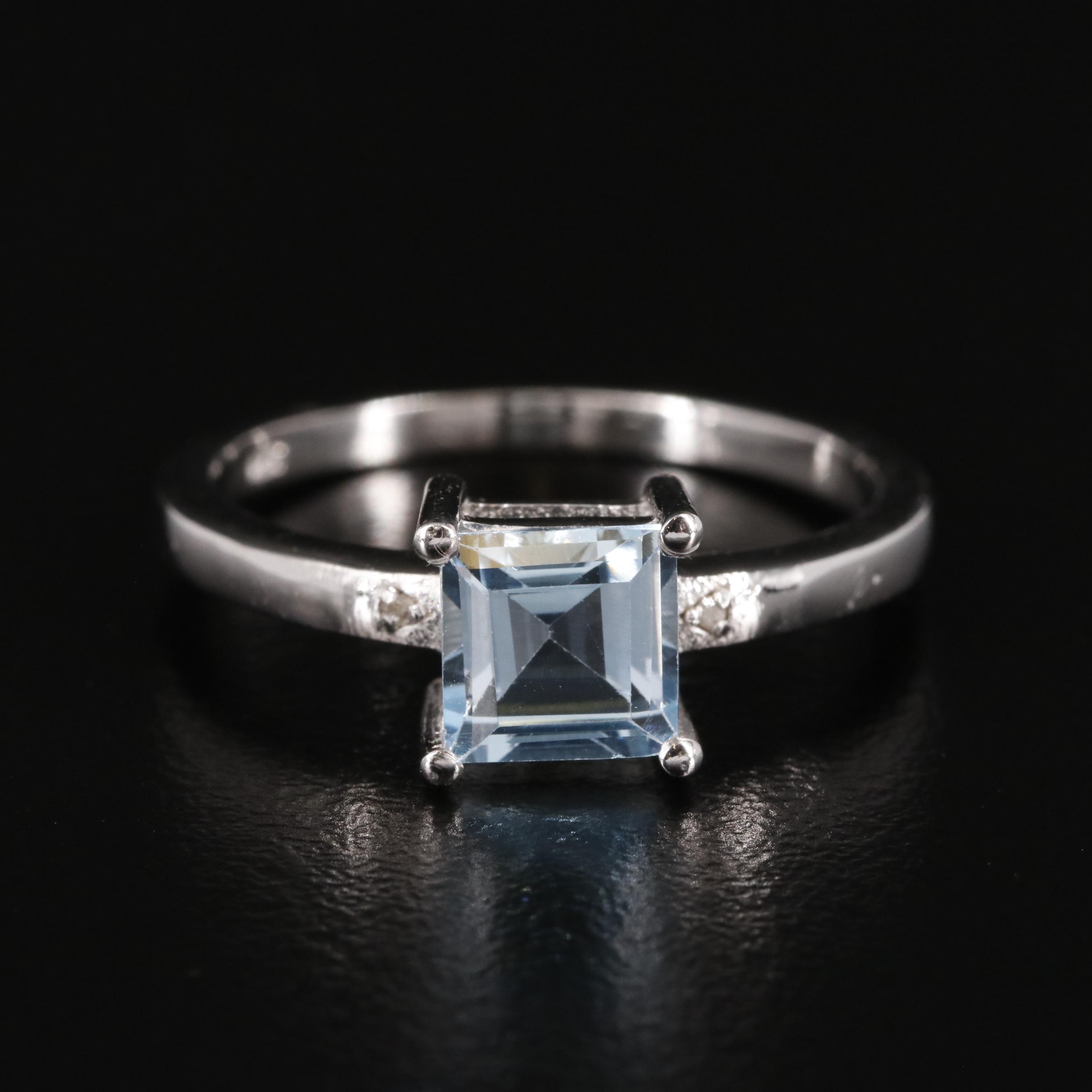 Sterling Blue Topaz Ring with Diamond Accents