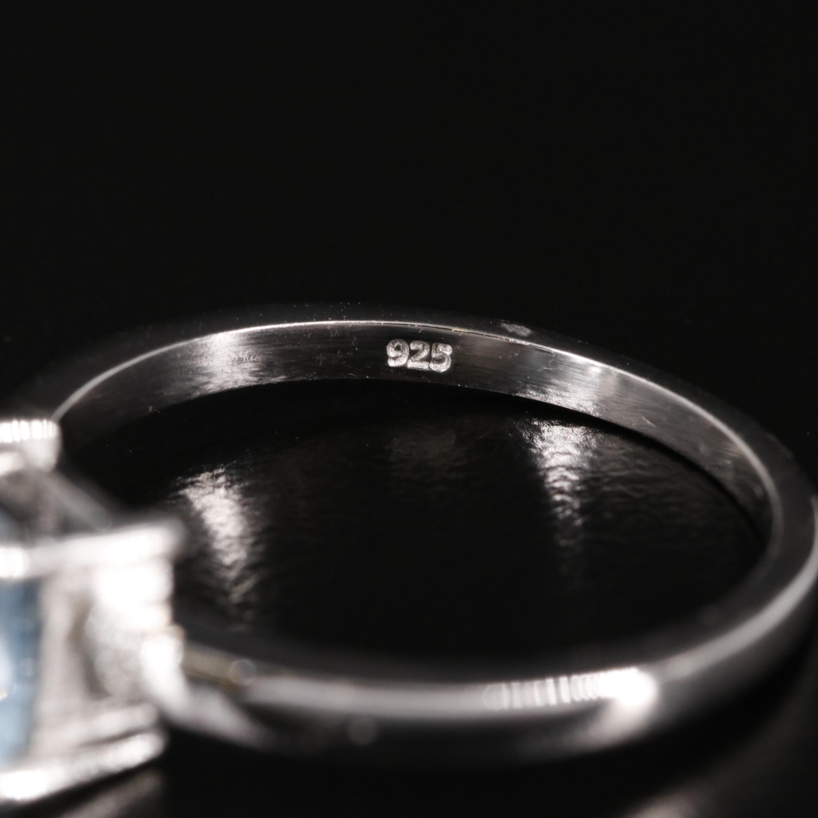 Sterling Blue Topaz Ring with Diamond Accents