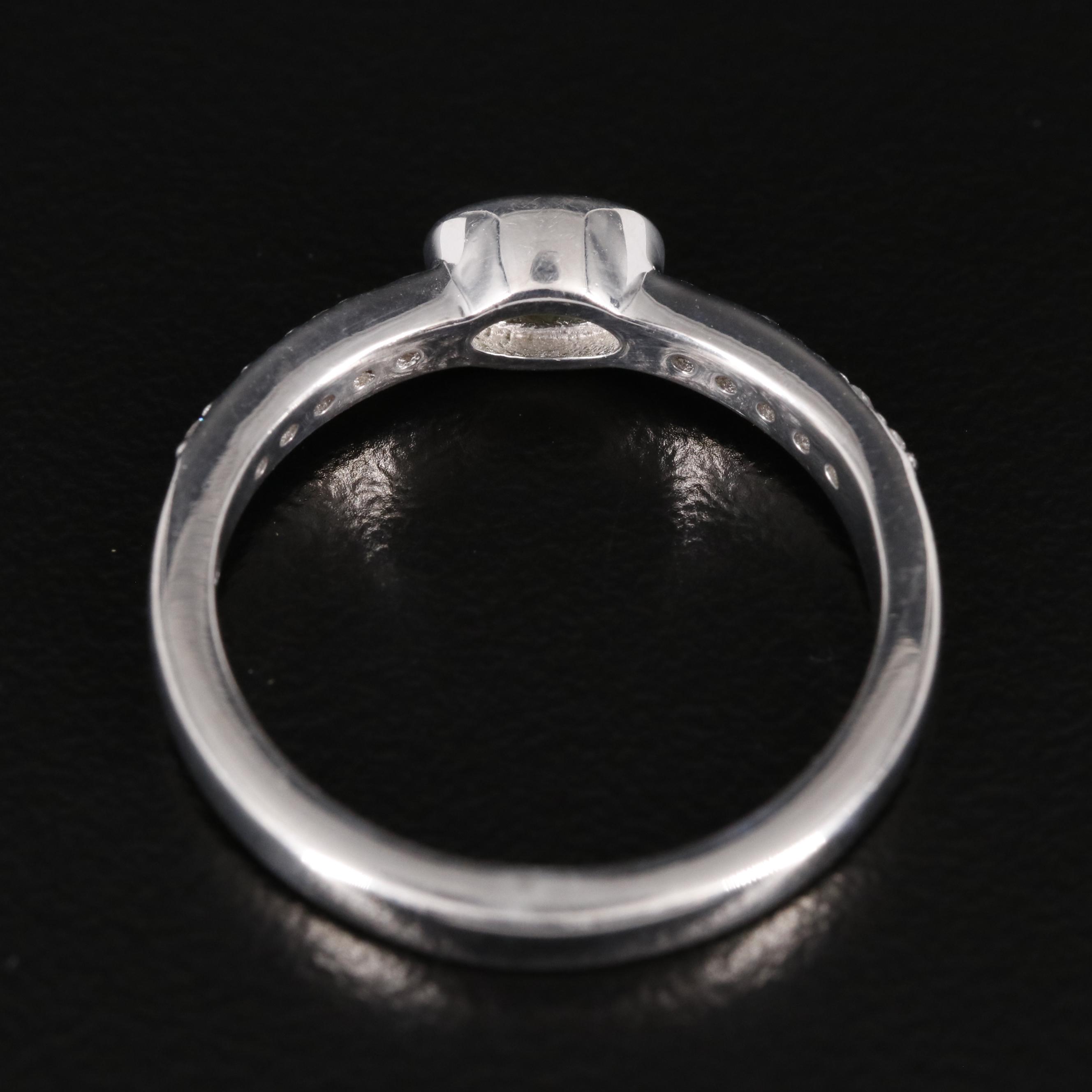 Sterling Peridot and White Topaz Ring