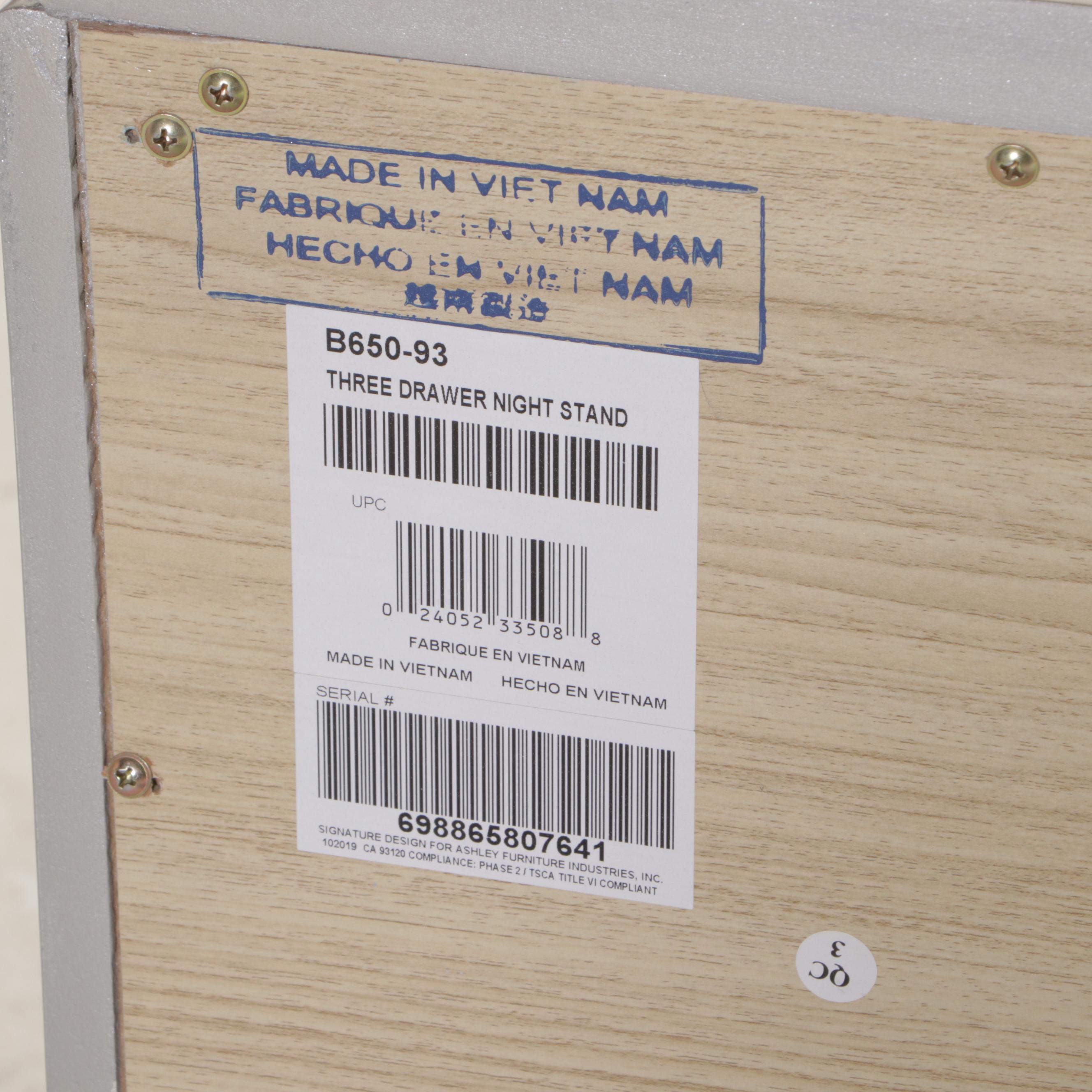 Ashley Furniture Silver-Gilt Three-Drawer Nightstand