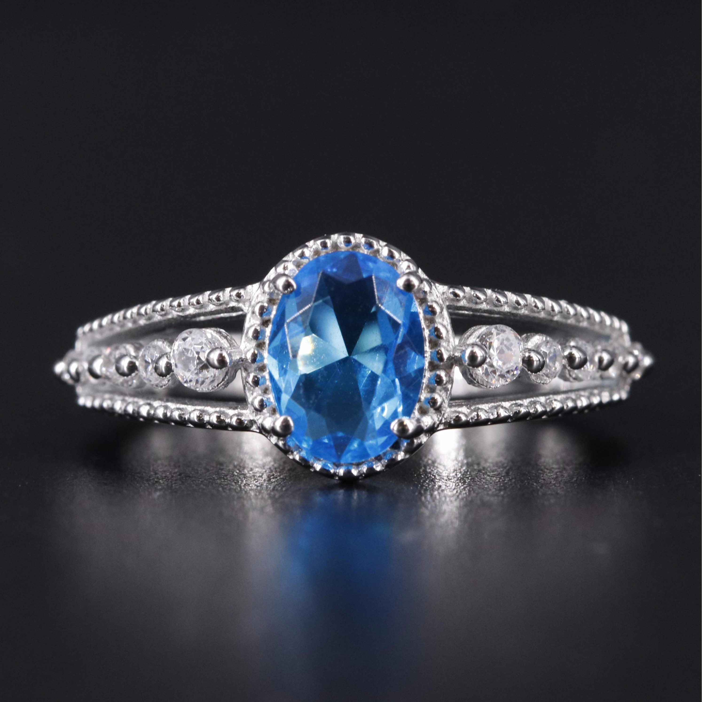 Sterling Silver Topaz and Cubic Zirconia Ring