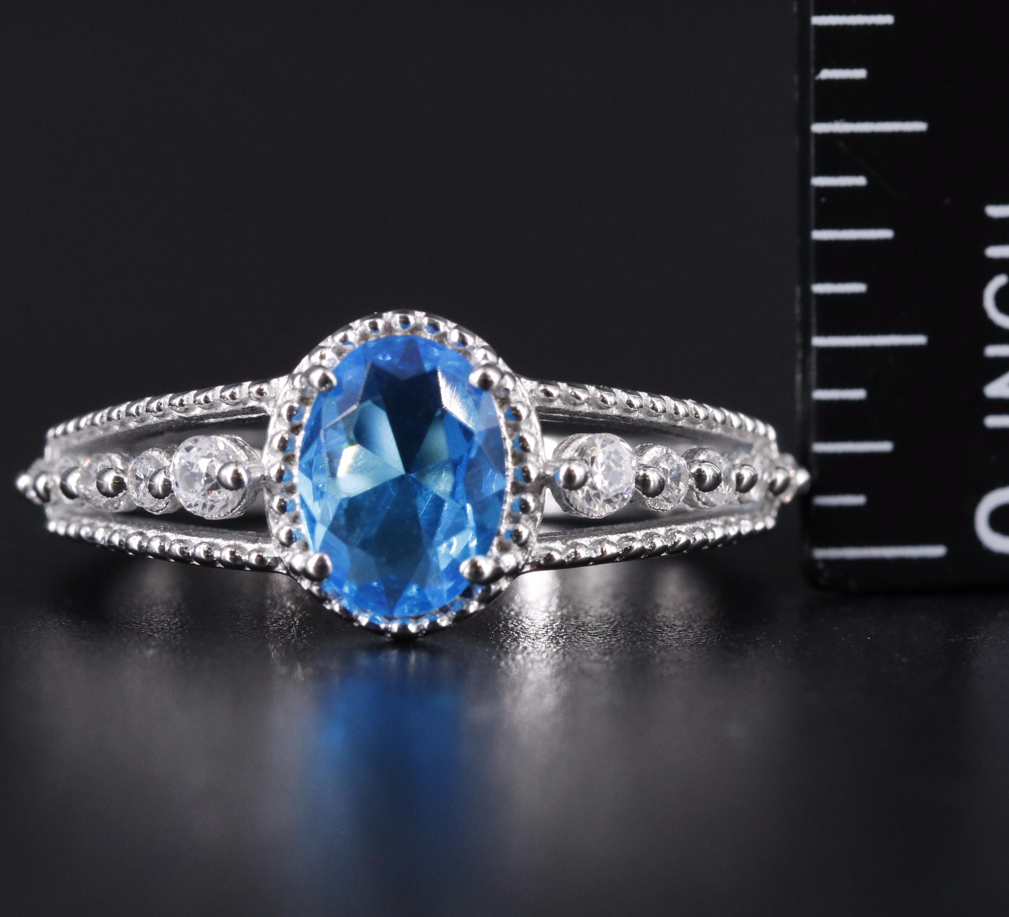 Sterling Silver Topaz and Cubic Zirconia Ring