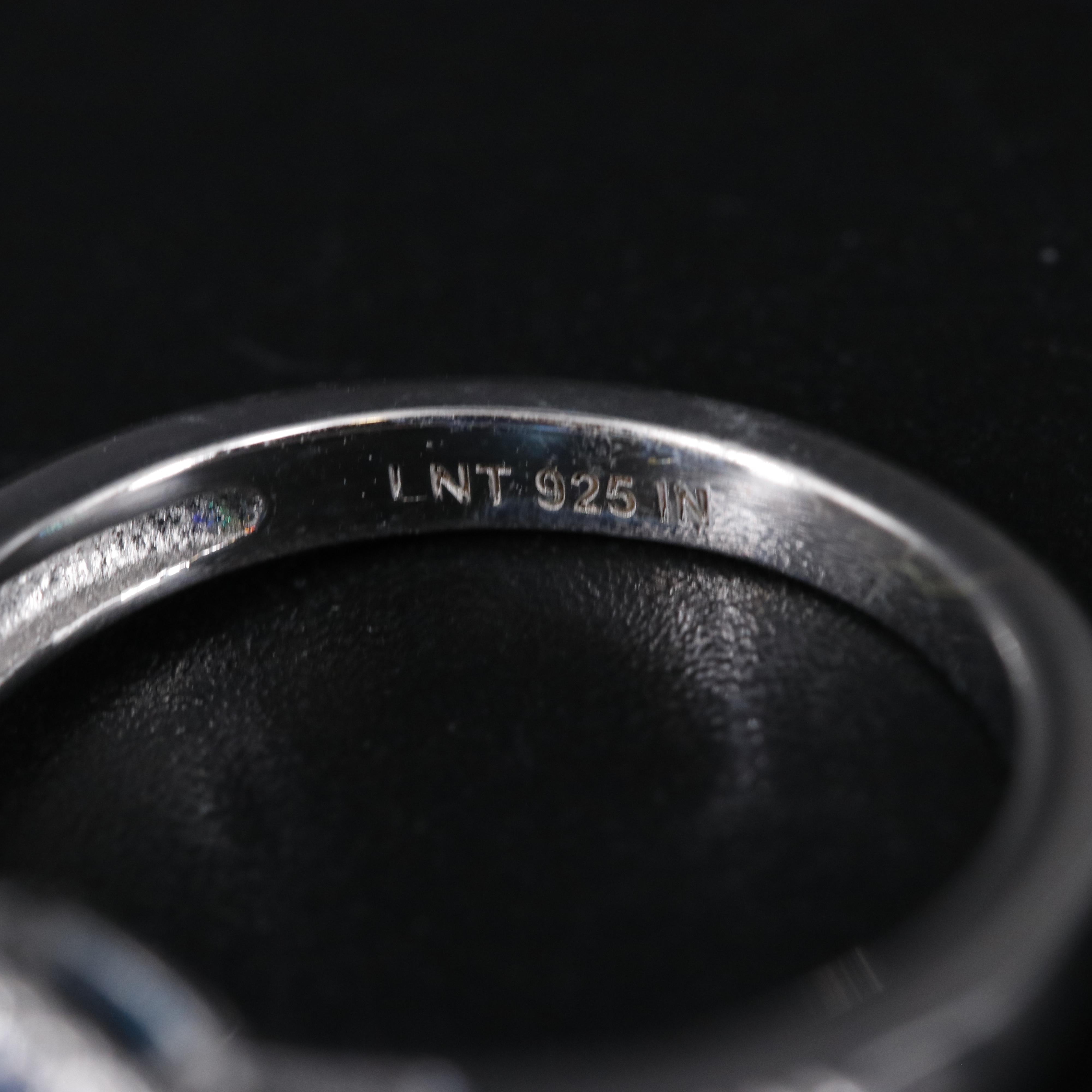 Sterling Silver Topaz and Cubic Zirconia Ring