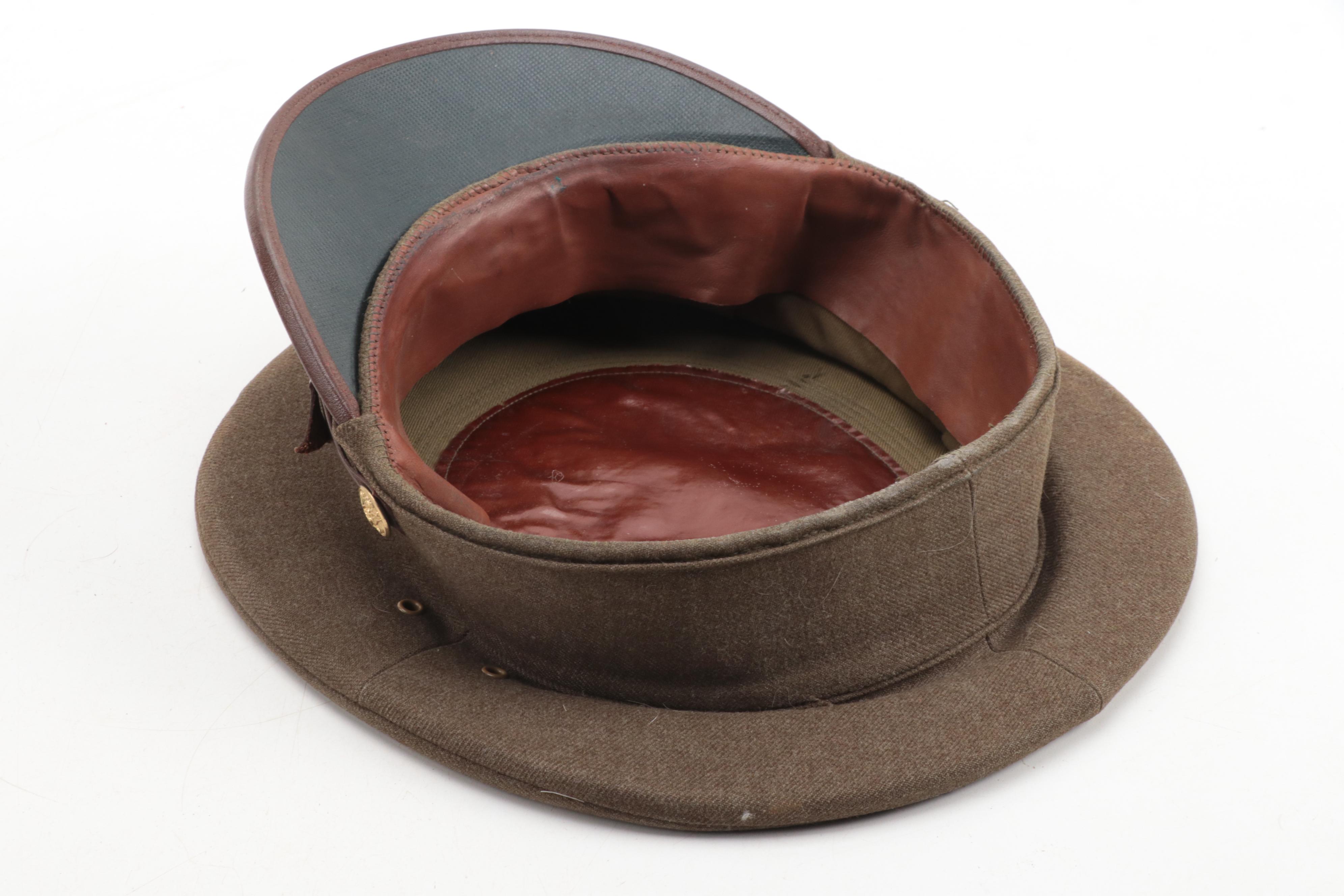 World War I and II Era Leg Gaiters, Brodie Helmet and Officer's Cap