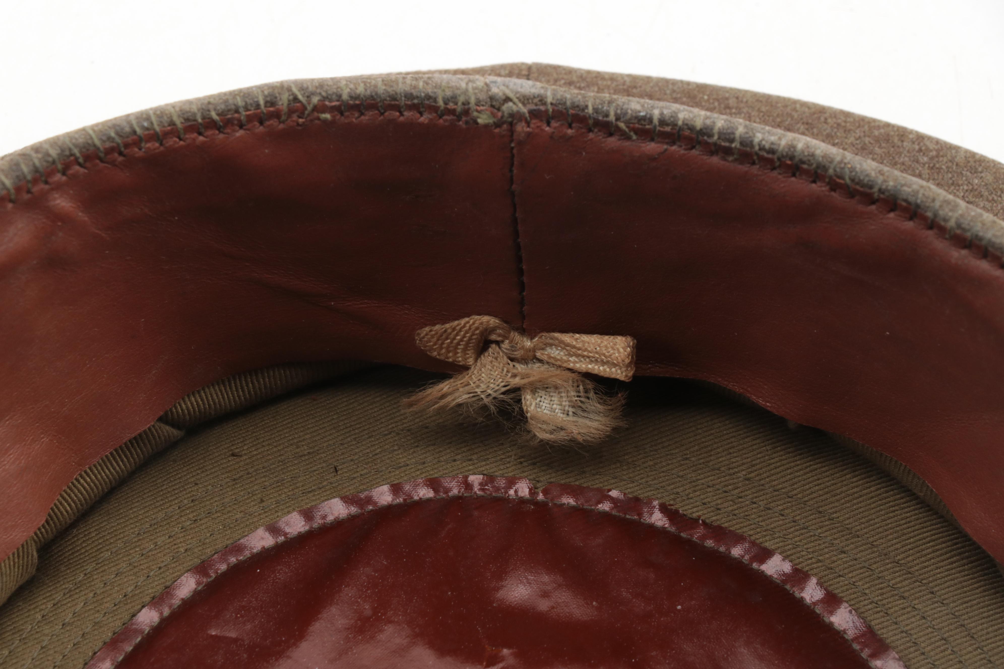 World War I and II Era Leg Gaiters, Brodie Helmet and Officer's Cap