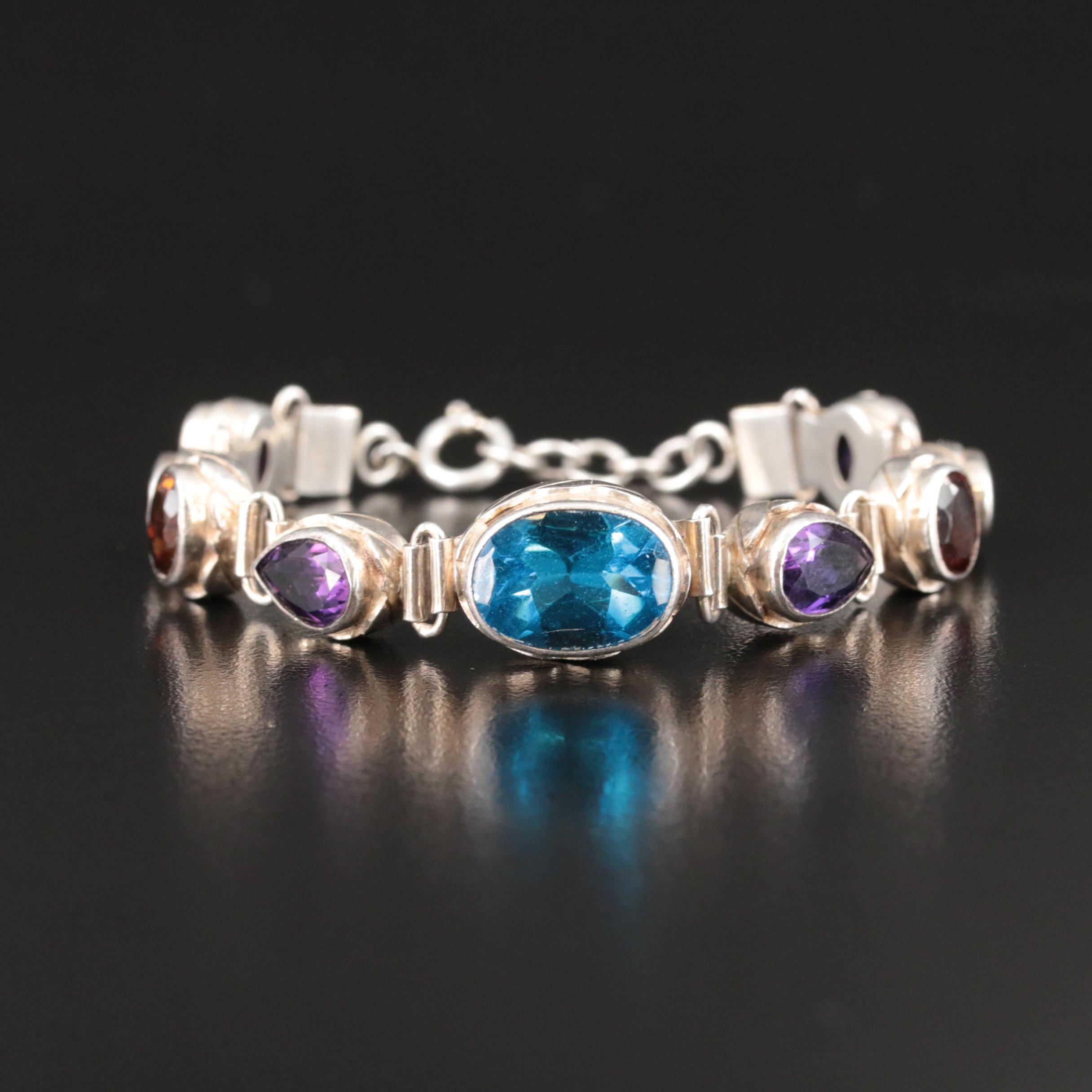 Sterling Swiss Blue Topaz, Amethyst and Garnet Bracelet