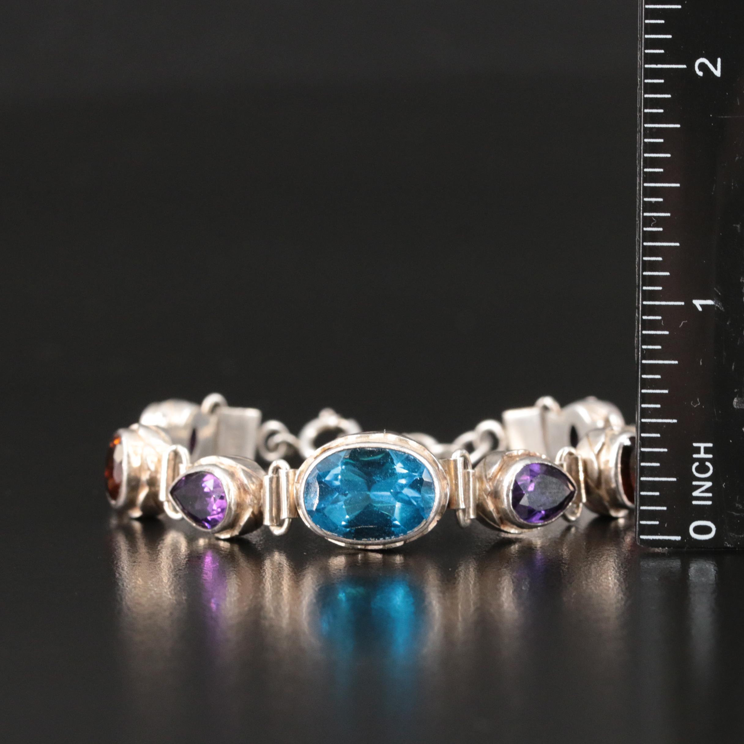Sterling Swiss Blue Topaz, Amethyst and Garnet Bracelet