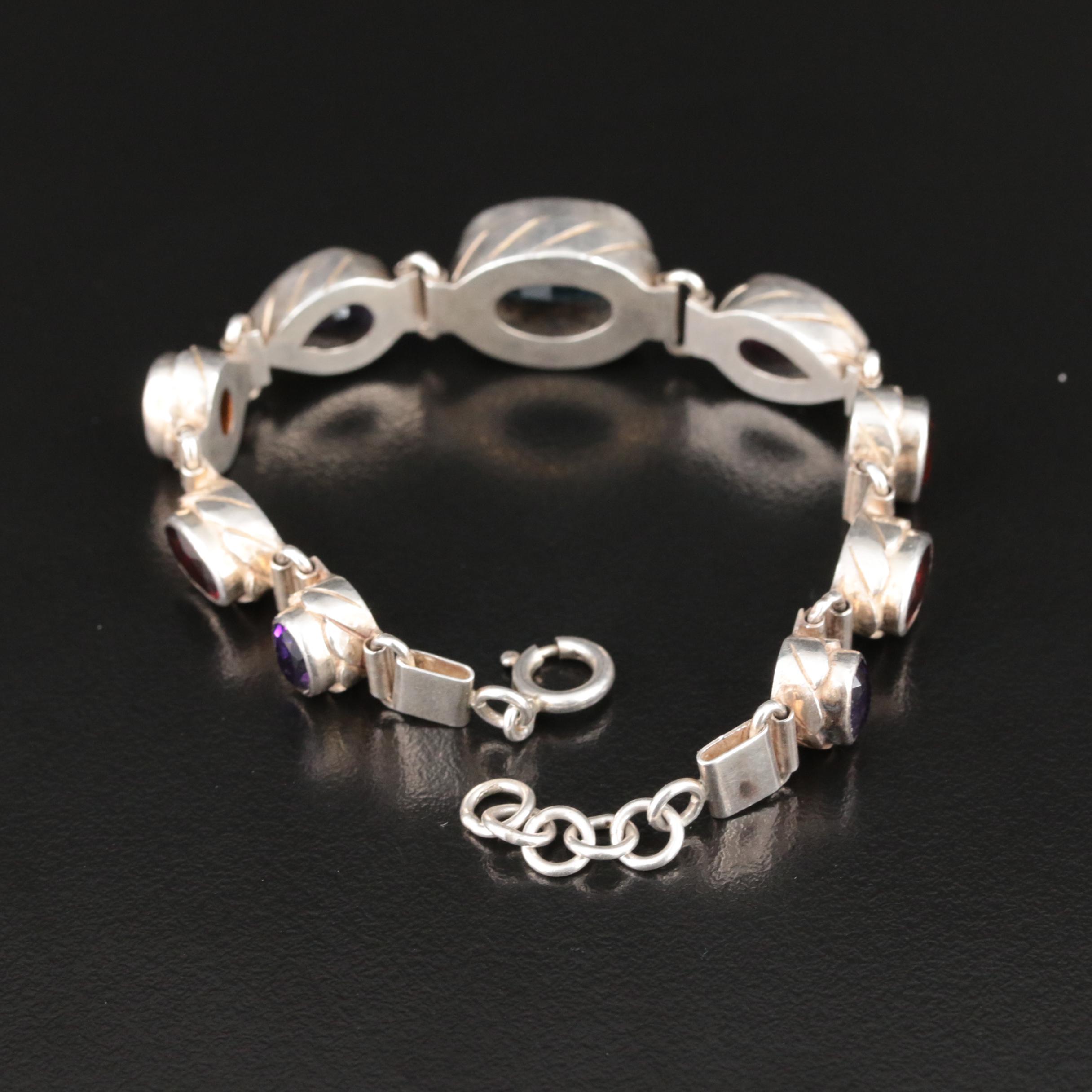 Sterling Swiss Blue Topaz, Amethyst and Garnet Bracelet