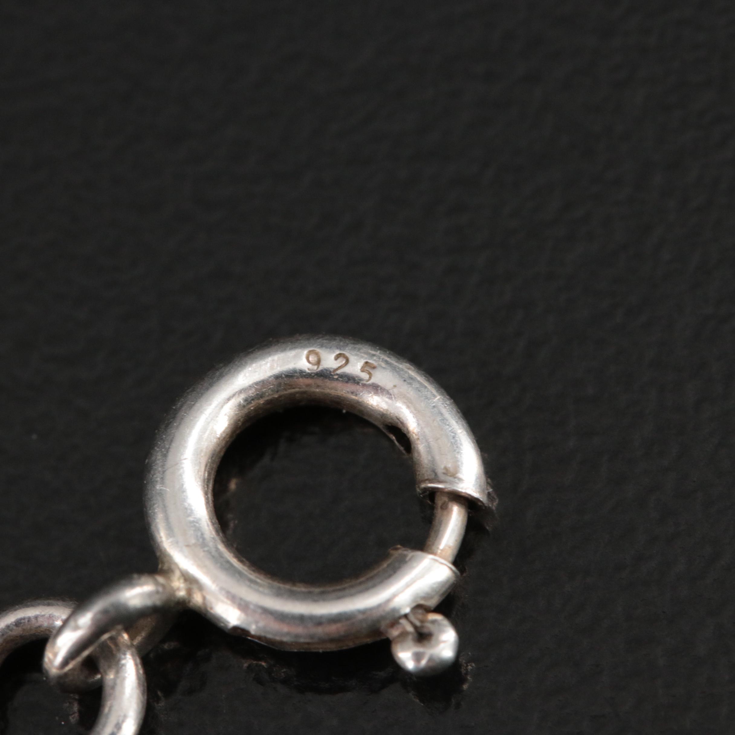 Sterling Swiss Blue Topaz, Amethyst and Garnet Bracelet